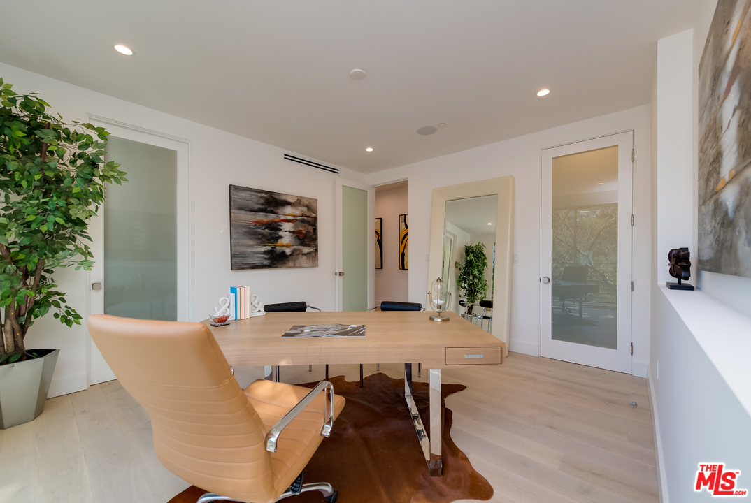 3431 Coy Drive Sherman Oaks, CA 91423 - Photo 30 of 54 a view of a dining room with furniture window and wooden floor