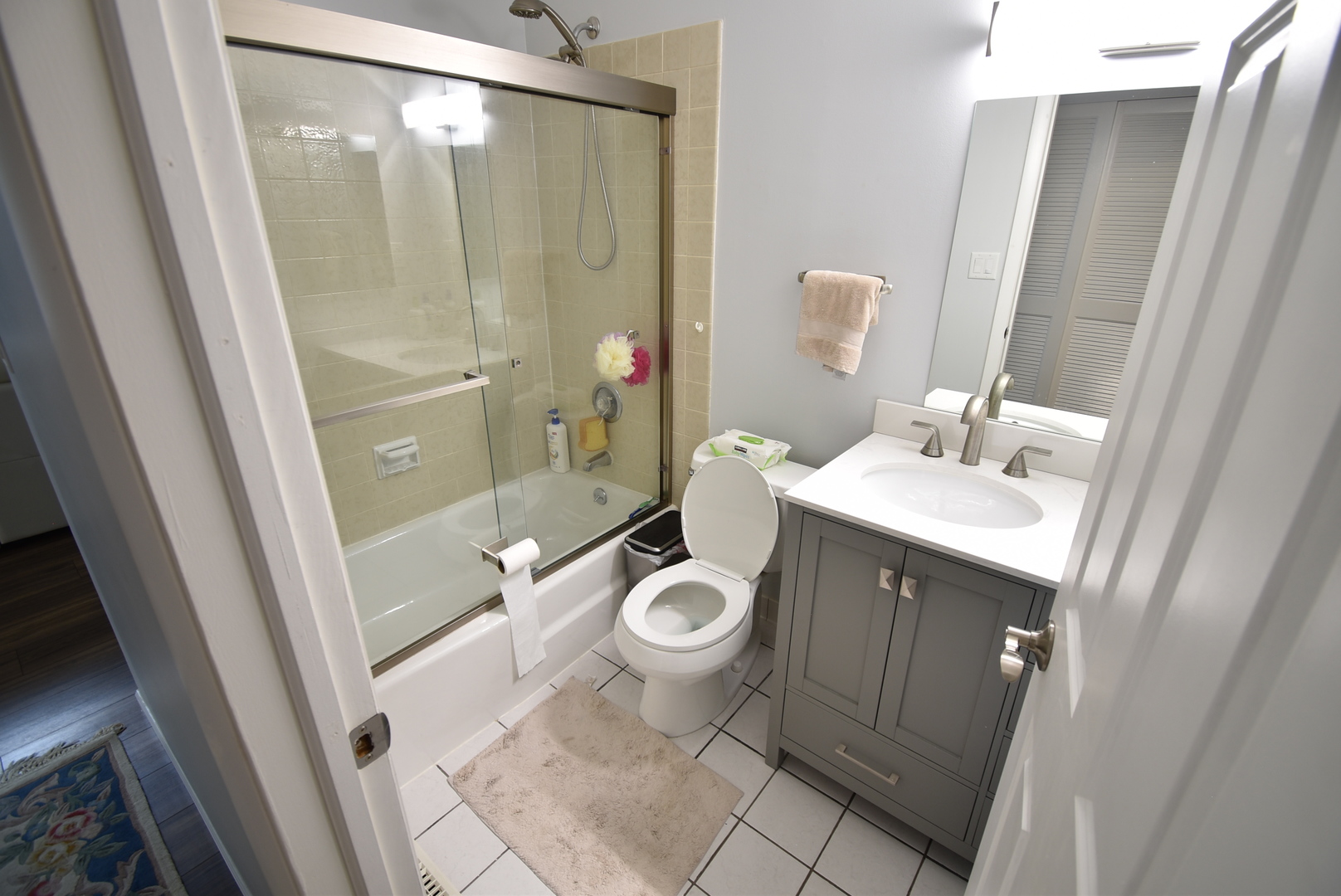 440 Red Bridge Road Lake Zurich, IL 60047 - Photo 14 of 15 a bathroom with a sink a toilet a mirror and shower