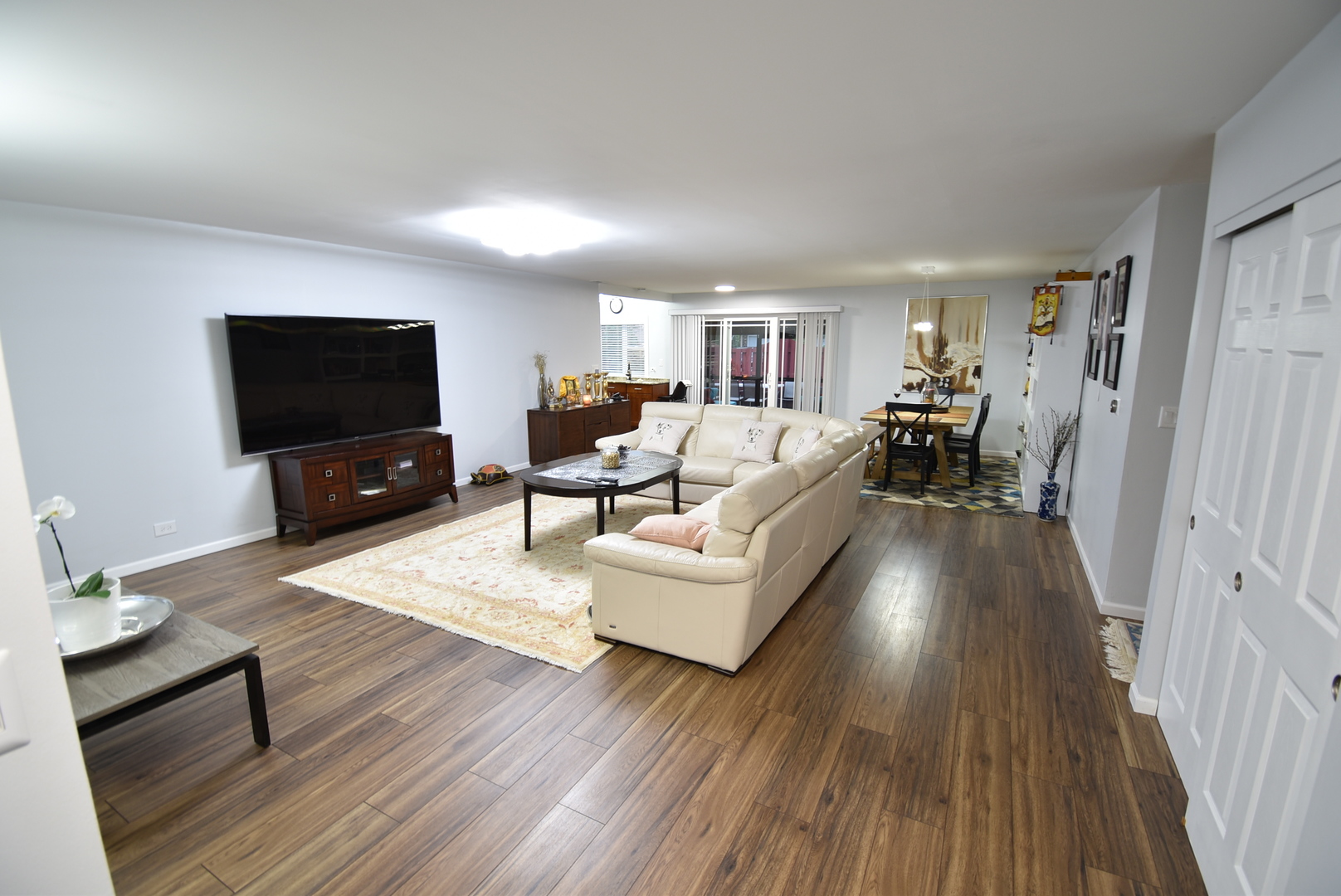 440 Red Bridge Road Lake Zurich, IL 60047 - Photo 3 of 15 a living room with furniture and a flat screen tv