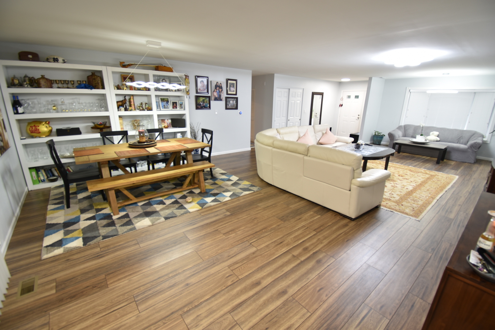 440 Red Bridge Road Lake Zurich, IL 60047 - Photo 4 of 15 a living room with furniture and a book shelf