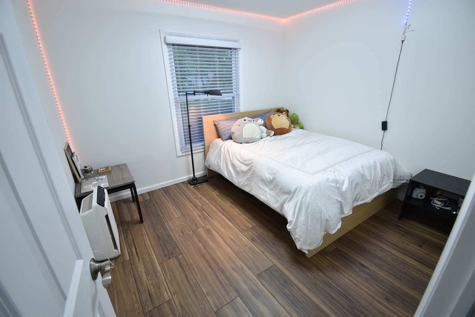 440 Red Bridge Road Lake Zurich, IL 60047 - Photo 6 of 15 a bedroom with a bed and wooden floor