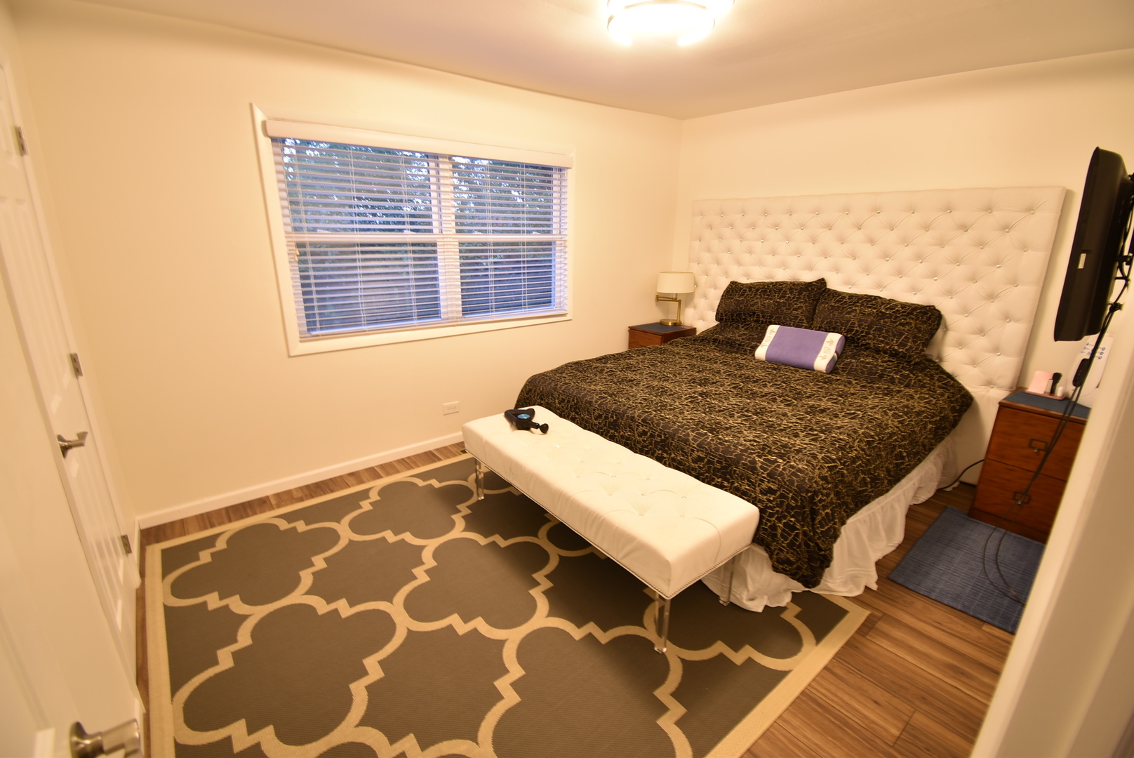 440 Red Bridge Road Lake Zurich, IL 60047 - Photo 10 of 15 a bedroom with a bed and wooden floor