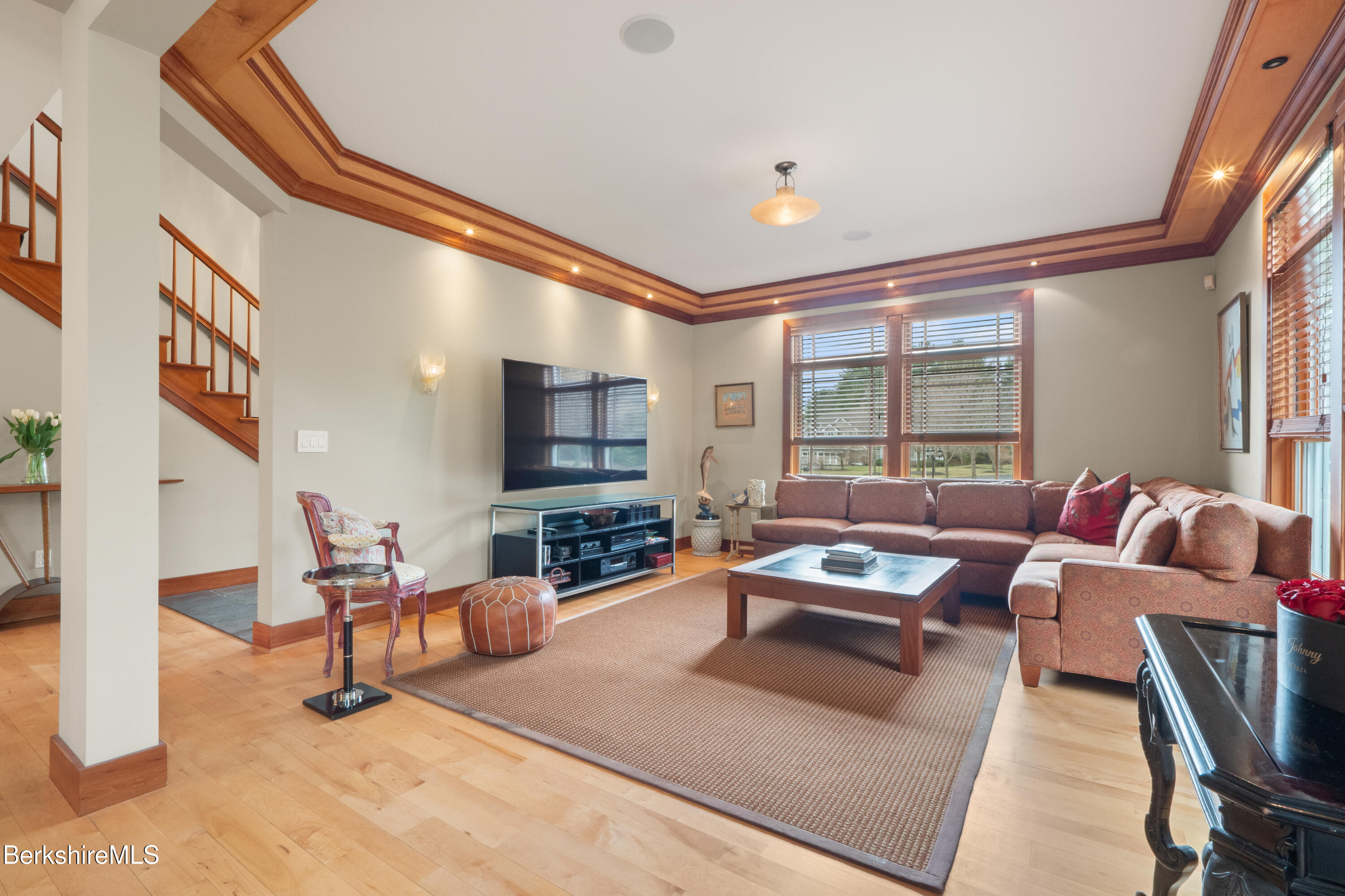 62 Stockbridge Terrace Lee, MA 01238 - Photo 12 of 49 a living room with furniture and a flat screen tv