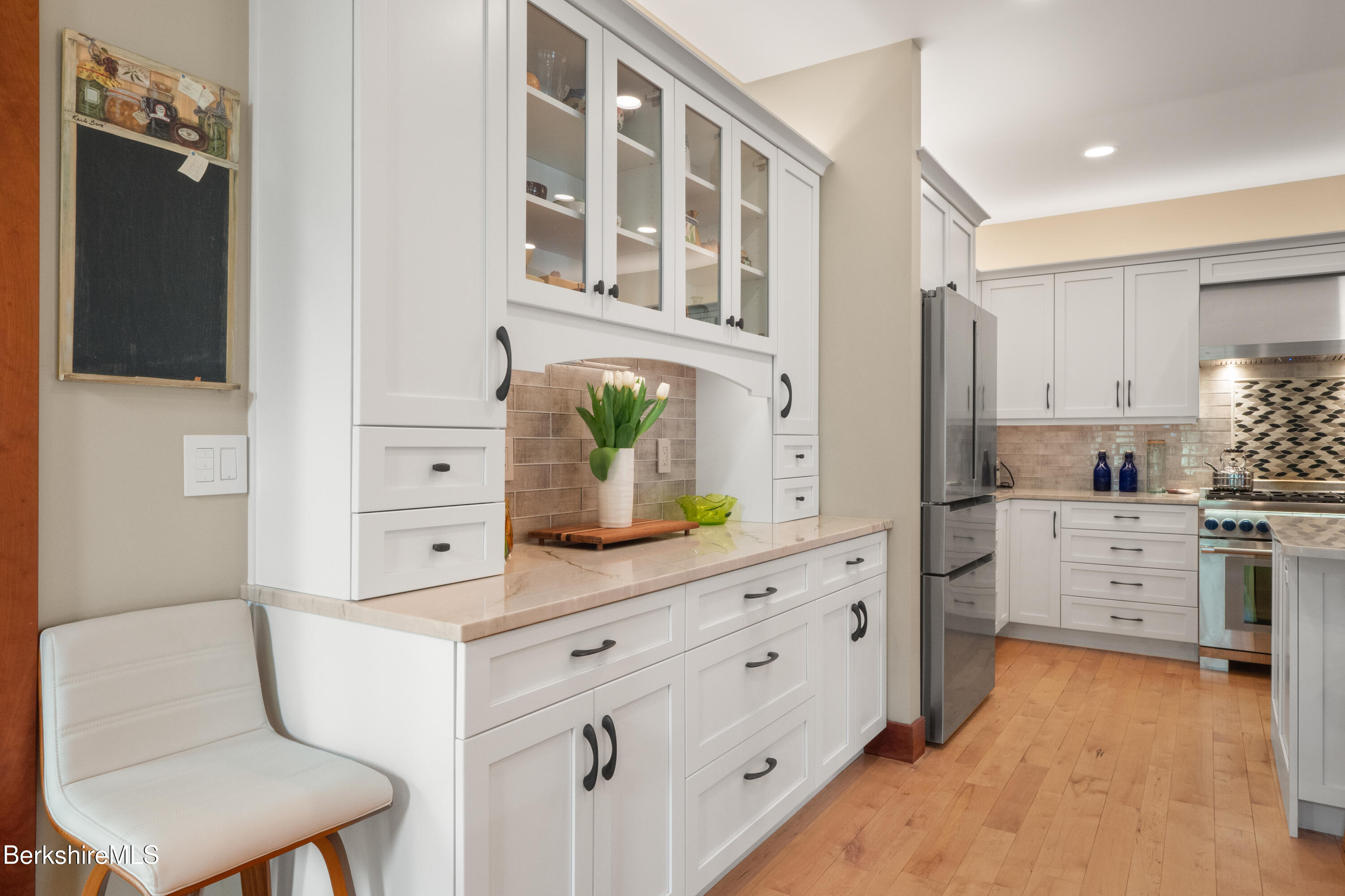 62 Stockbridge Terrace Lee, MA 01238 - Photo 17 of 49 a kitchen with cabinets and window