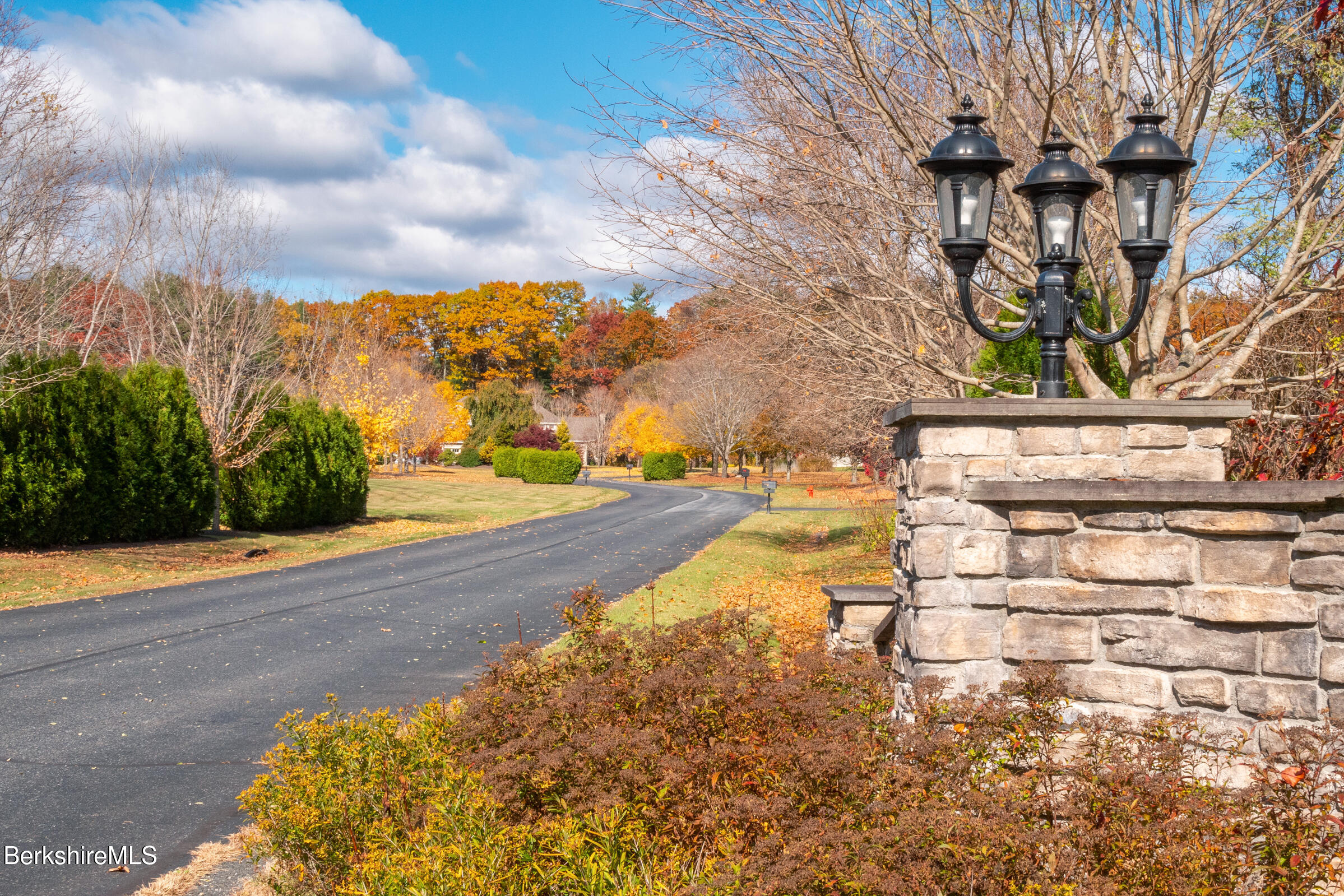 62 Stockbridge Terrace Lee, MA 01238 - Photo 2 of 49 a view of yard with wooden fence
