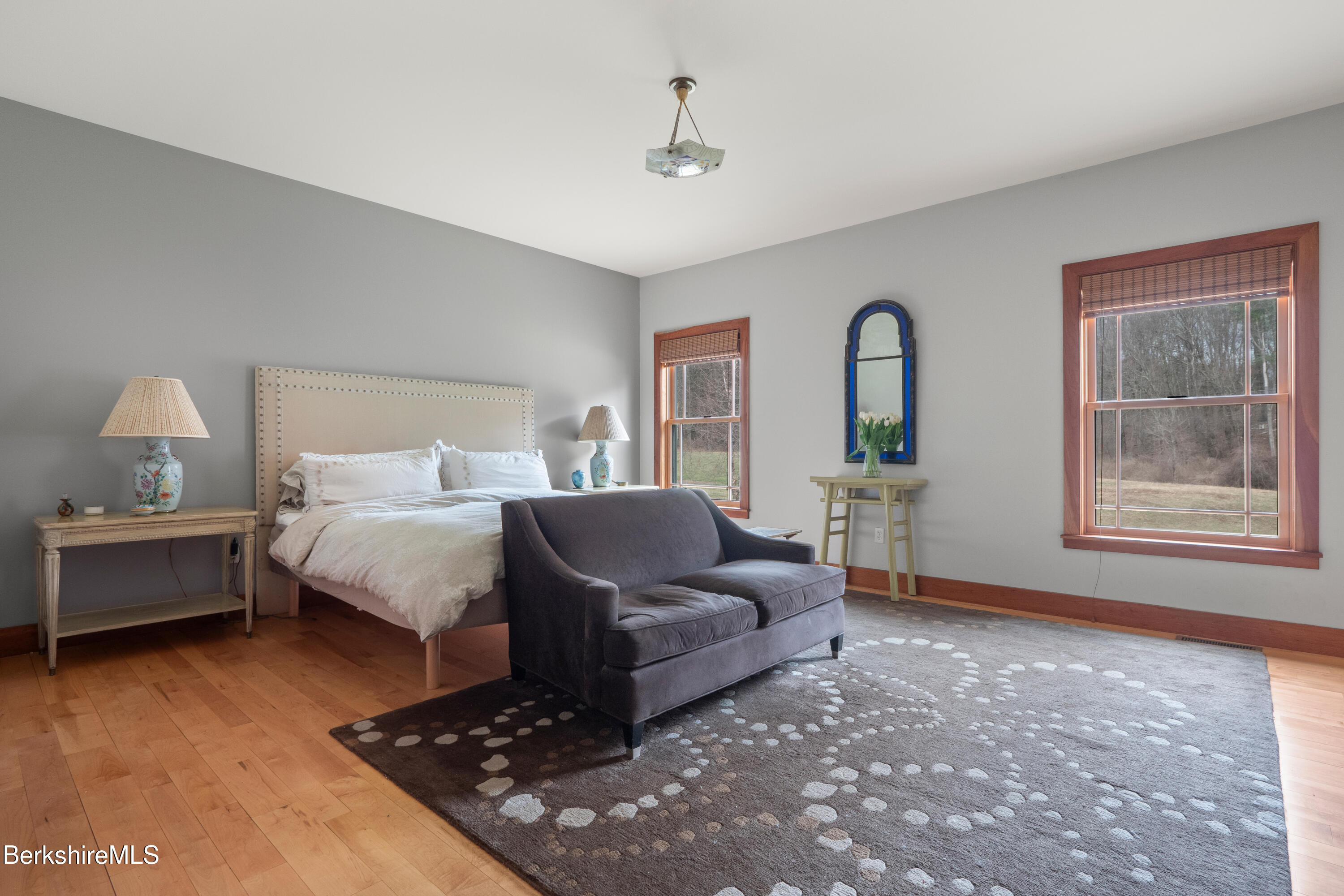 62 Stockbridge Terrace Lee, MA 01238 - Photo 21 of 49 a spacious bedroom with a bed window and dresser