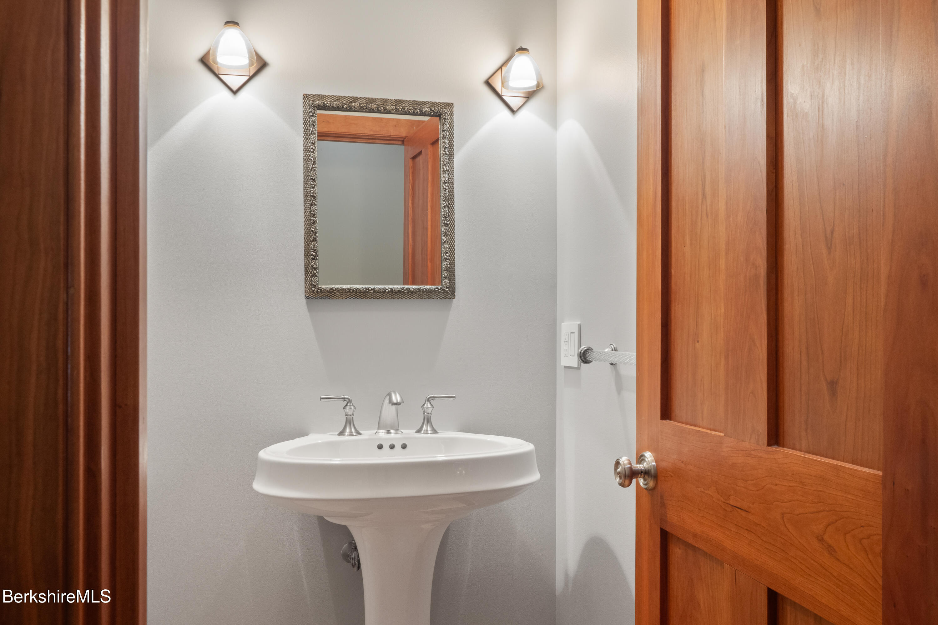 62 Stockbridge Terrace Lee, MA 01238 - Photo 25 of 49 a bathroom with a sink and a mirror