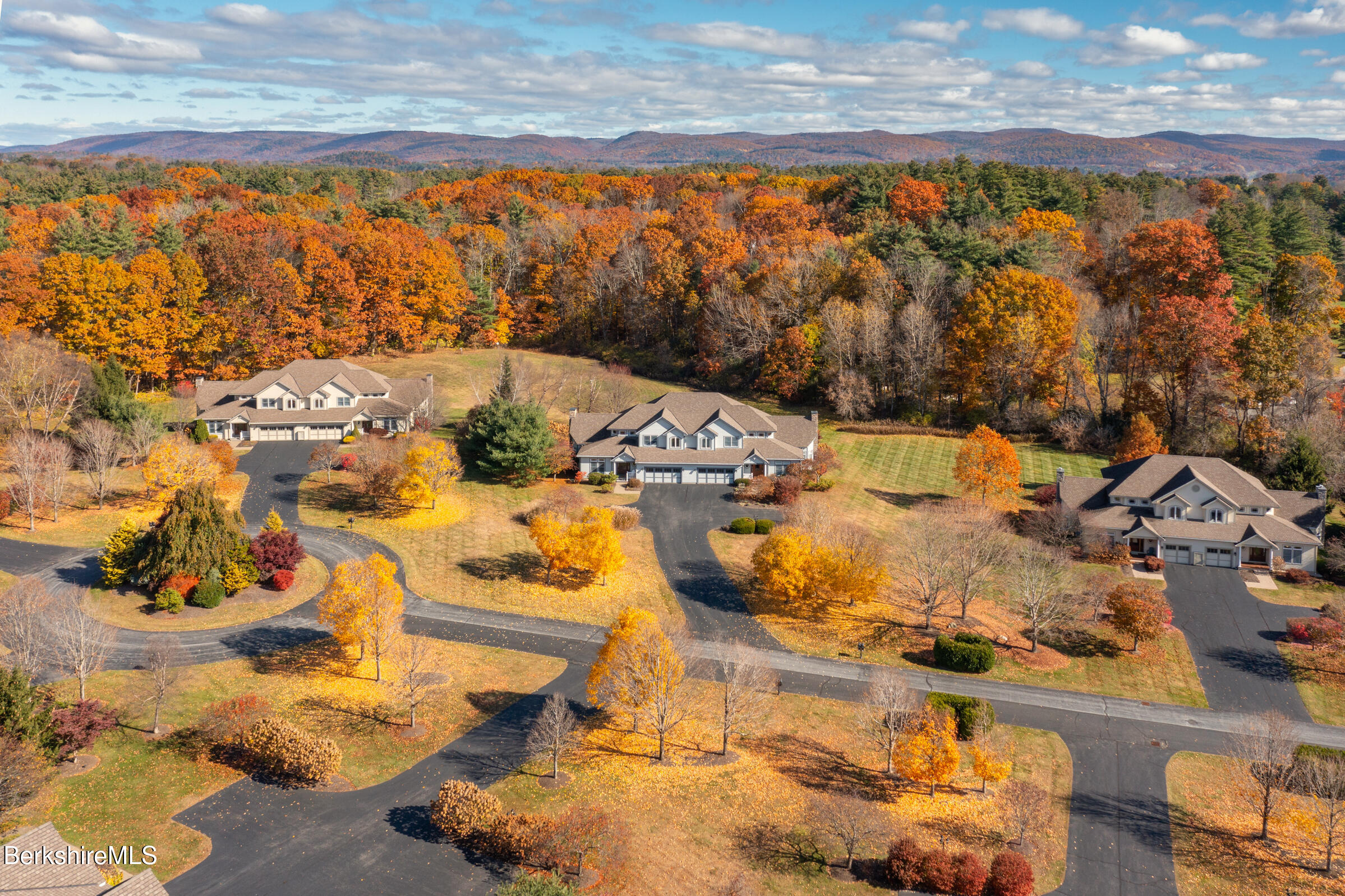 62 Stockbridge Terrace Lee, MA 01238 - Photo 3 of 49 an aerial view of residential houses with outdoor space