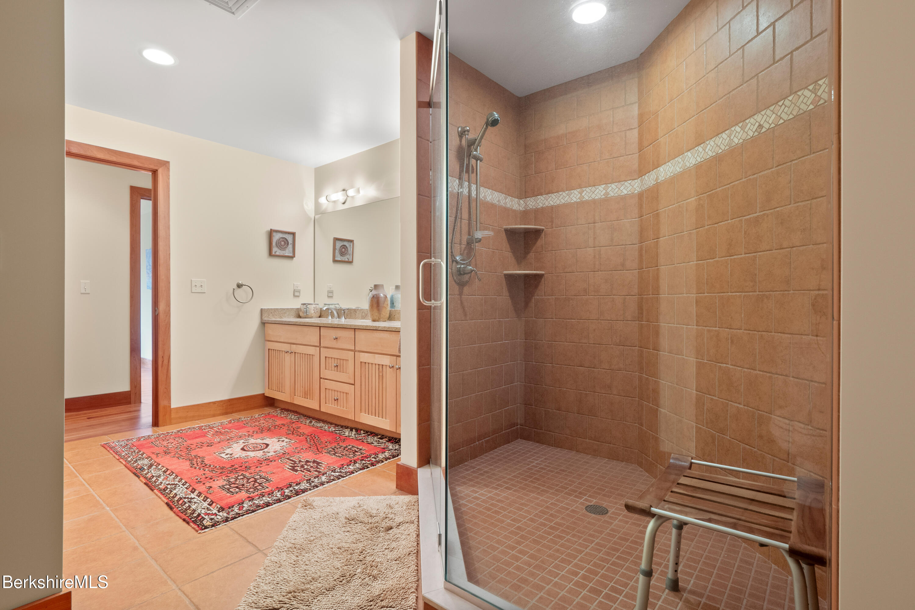 62 Stockbridge Terrace Lee, MA 01238 - Photo 36 of 49 a bathroom with a sink and a mirror