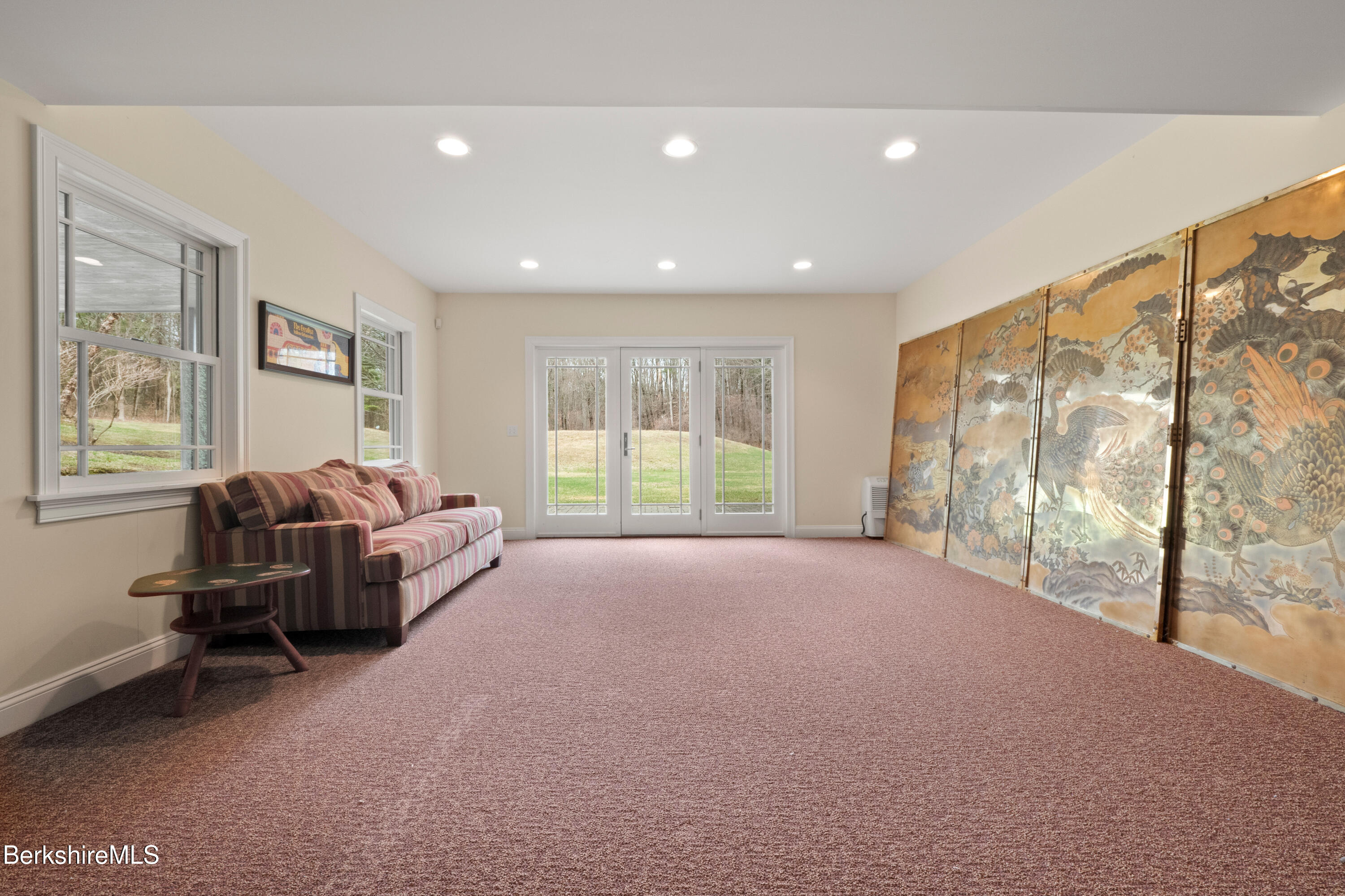 62 Stockbridge Terrace Lee, MA 01238 - Photo 39 of 49 a living room with furniture and a large window