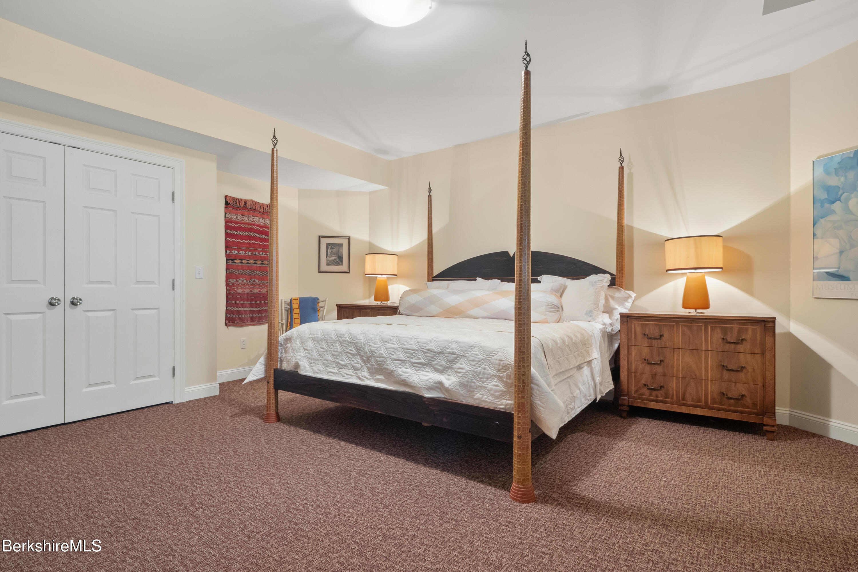 62 Stockbridge Terrace Lee, MA 01238 - Photo 40 of 49 a bedroom with a bed window and dresser