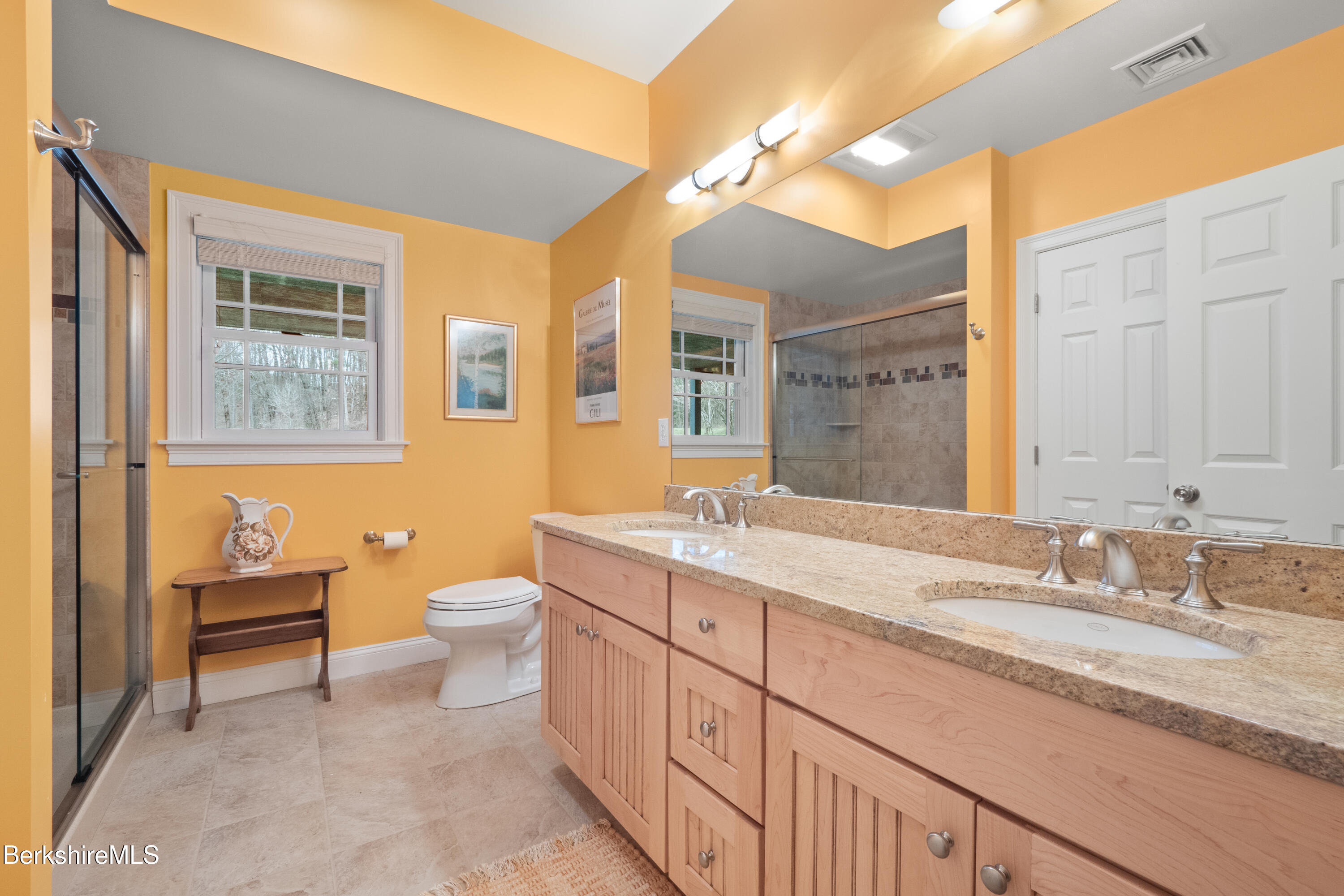 62 Stockbridge Terrace Lee, MA 01238 - Photo 41 of 49 a bathroom with a granite countertop sink mirror and a toilet