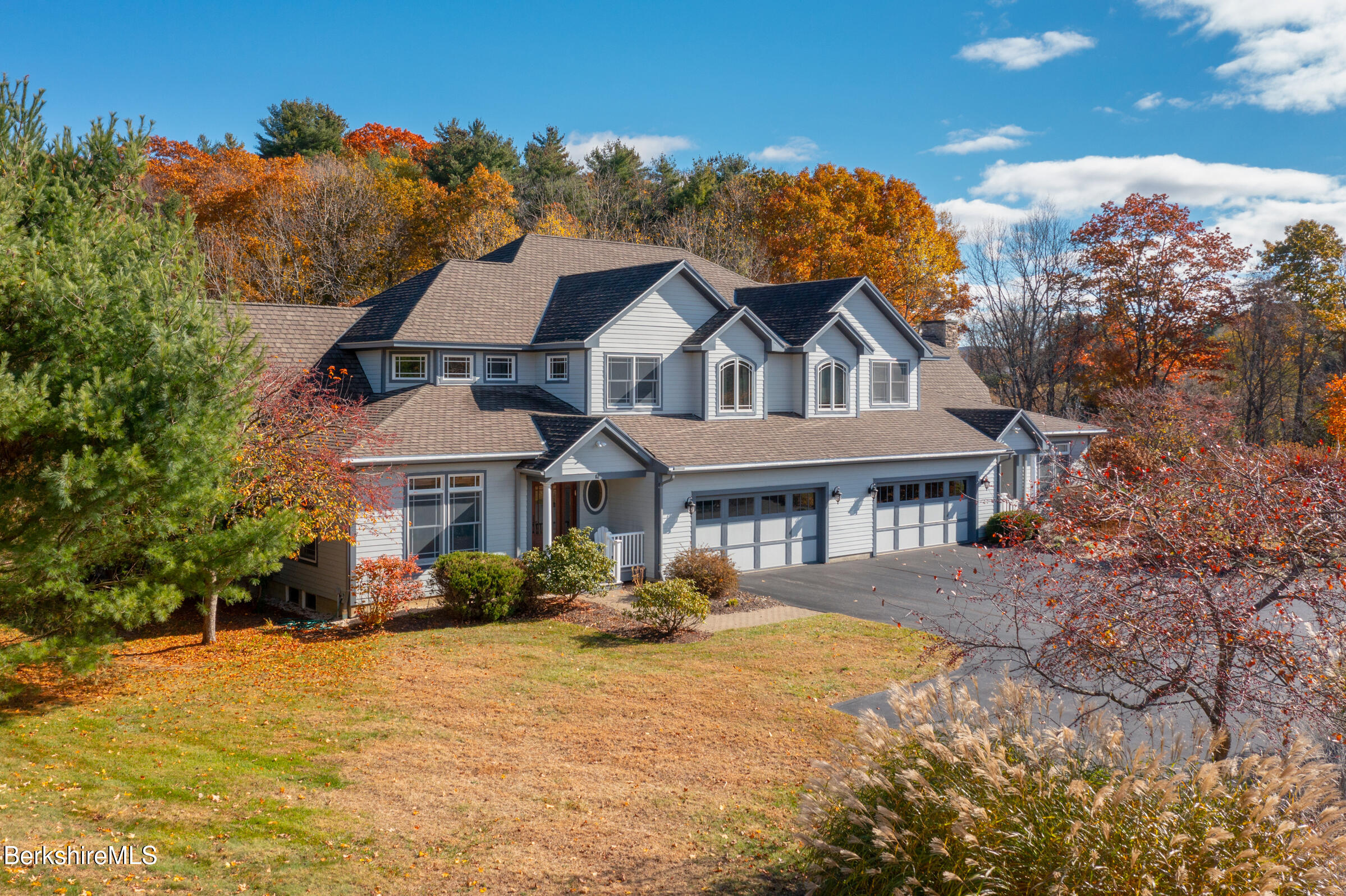 62 Stockbridge Terrace Lee, MA 01238 - Photo 46 of 49 a front view of a house with a yard