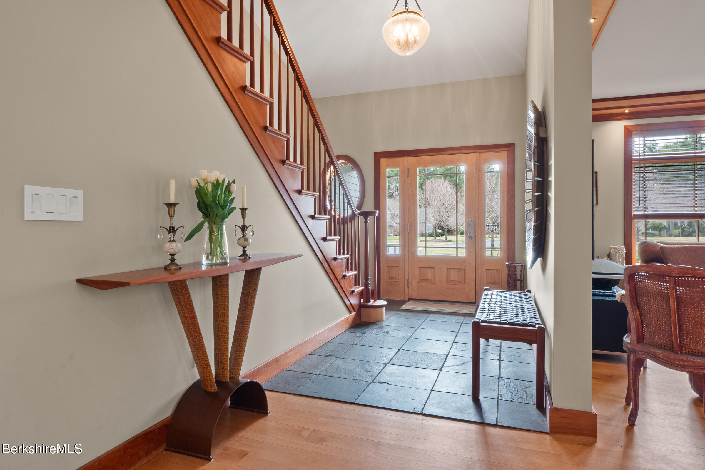 62 Stockbridge Terrace Lee, MA 01238 - Photo 7 of 49 a view of an entryway with wooden floor and windows