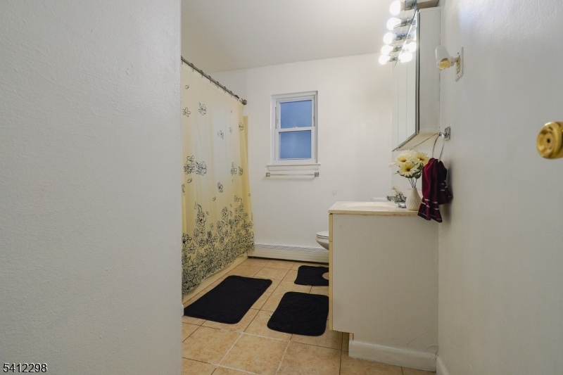 72 Fox Road, Unit 1B Edison, NJ 08817 - Photo 23 of 29 a bathroom with a sink and a shower