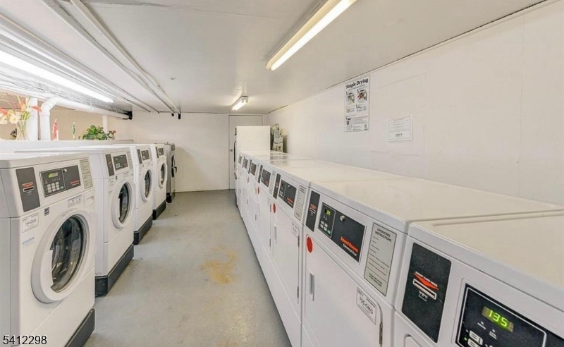 72 Fox Road, Unit 1B Edison, NJ 08817 - Photo 29 of 29 a view of an entryway with washer and dryer
