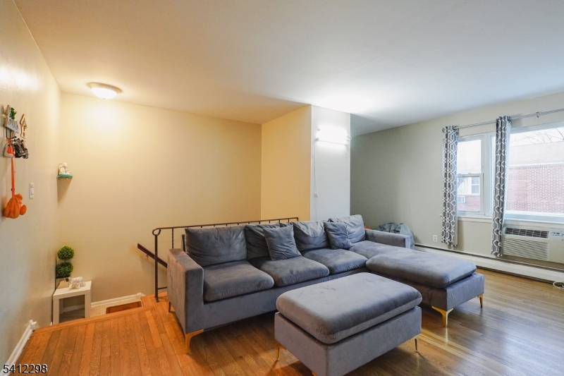 72 Fox Road, Unit 1B Edison, NJ 08817 - Photo 7 of 29 a living room with furniture and a window