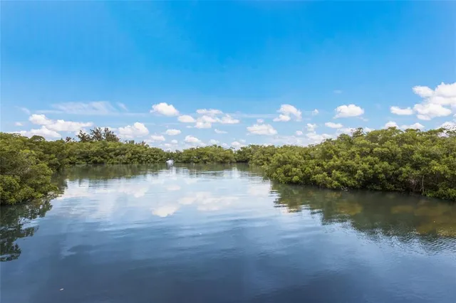 a view of balcony and yard