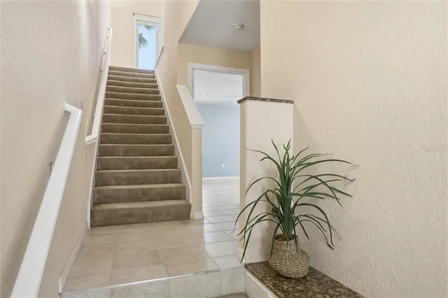 a view of entryway with stairs