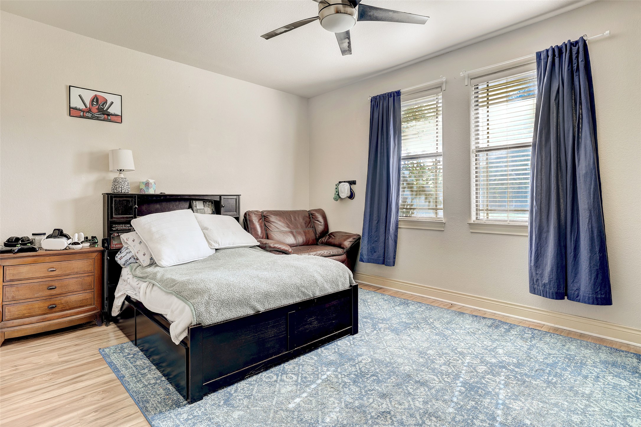 Undisclosed Address Georgetown, TX 78633 - Photo 30 of 39 a spacious bedroom with a bed and window