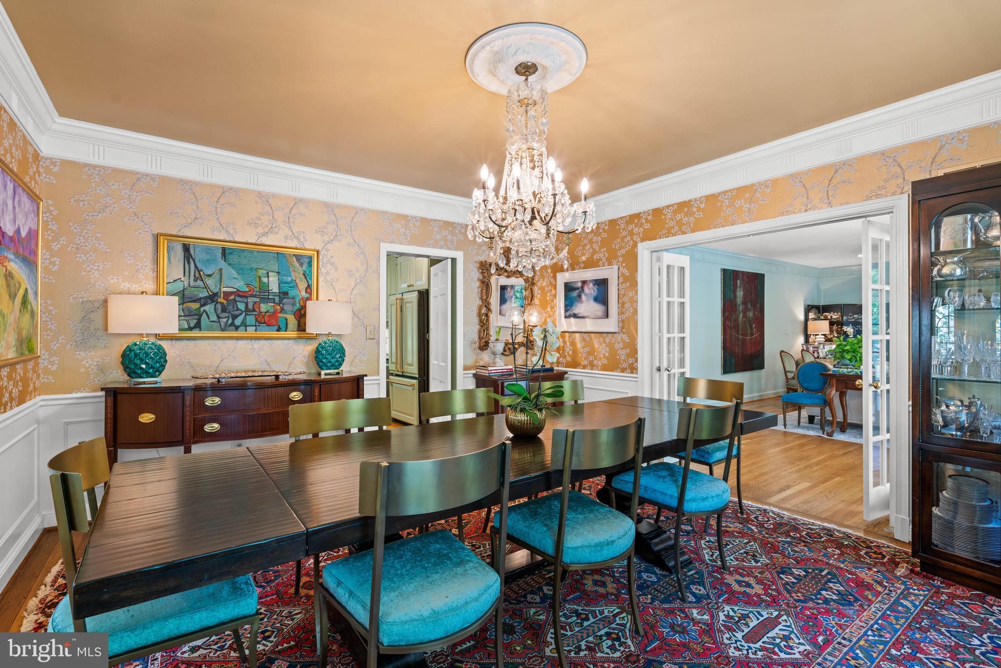 8 Farmington Court Chevy Chase, MD 20815 - Photo 12 of 34 a view of a dining room with furniture and chandelier
