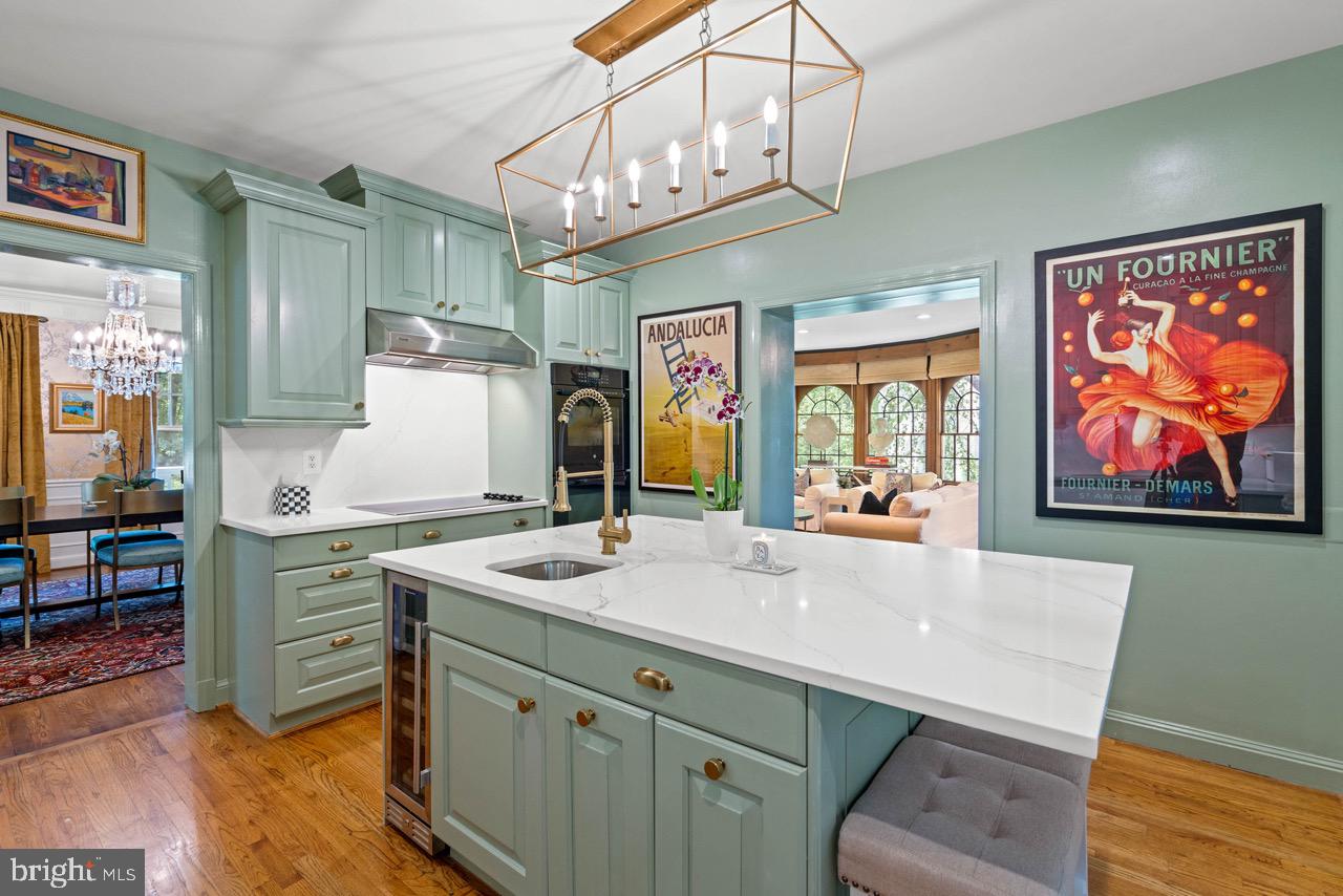 8 Farmington Court Chevy Chase, MD 20815 - Photo 14 of 34 a kitchen with a sink and cabinets