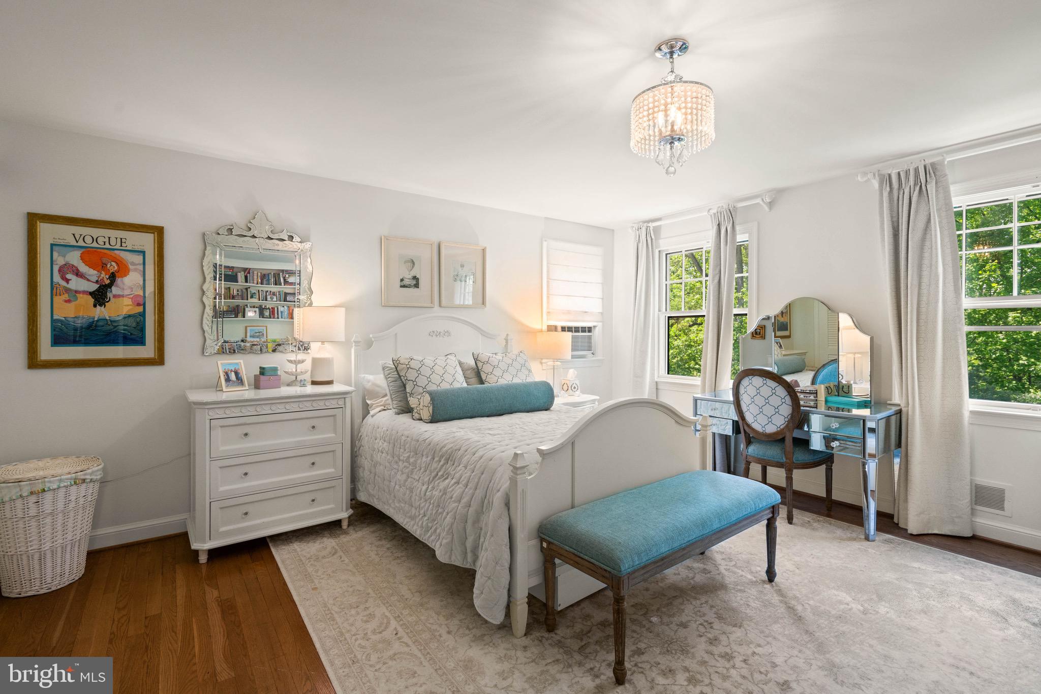 8 Farmington Court Chevy Chase, MD 20815 - Photo 26 of 34 a bedroom with a bed and wooden floor