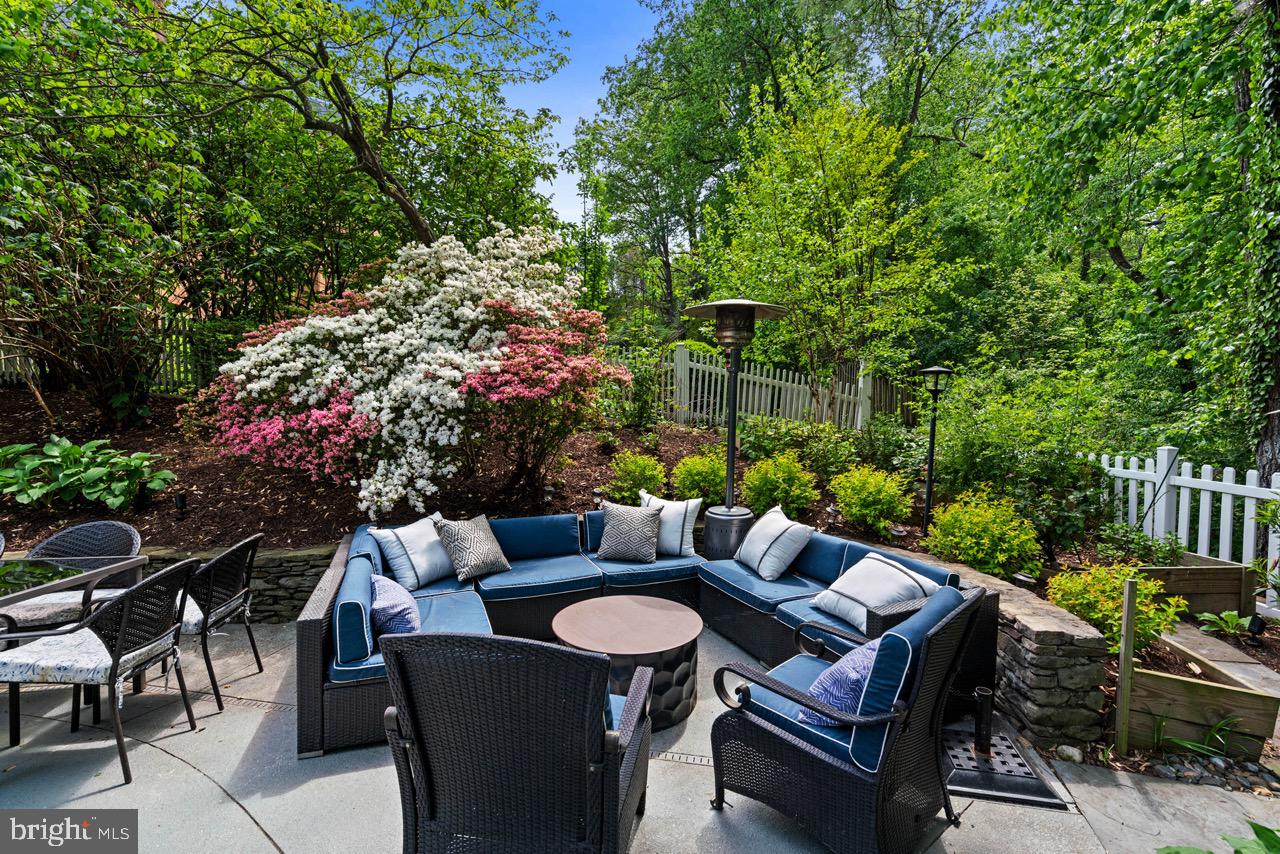 8 Farmington Court Chevy Chase, MD 20815 - Photo 33 of 34 a view of a patio with couple of chairs and a fire pit