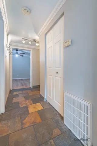 a view of entryway with bathroom