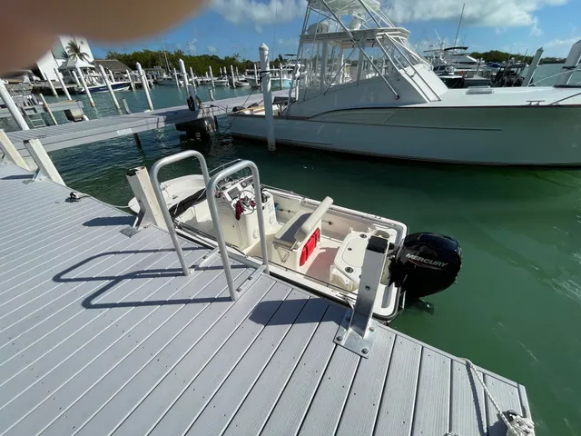 a balcony with table and chairs