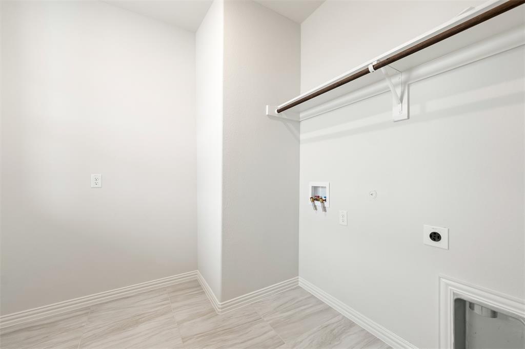 157 Brandywine Trail Rhome, TX 76078 - Photo 19 of 33 Laundry room featuring washer hookup, electric dryer hookup, and gas dryer hookup