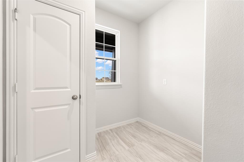 157 Brandywine Trail Rhome, TX 76078 - Photo 20 of 33 Empty room featuring baseboards