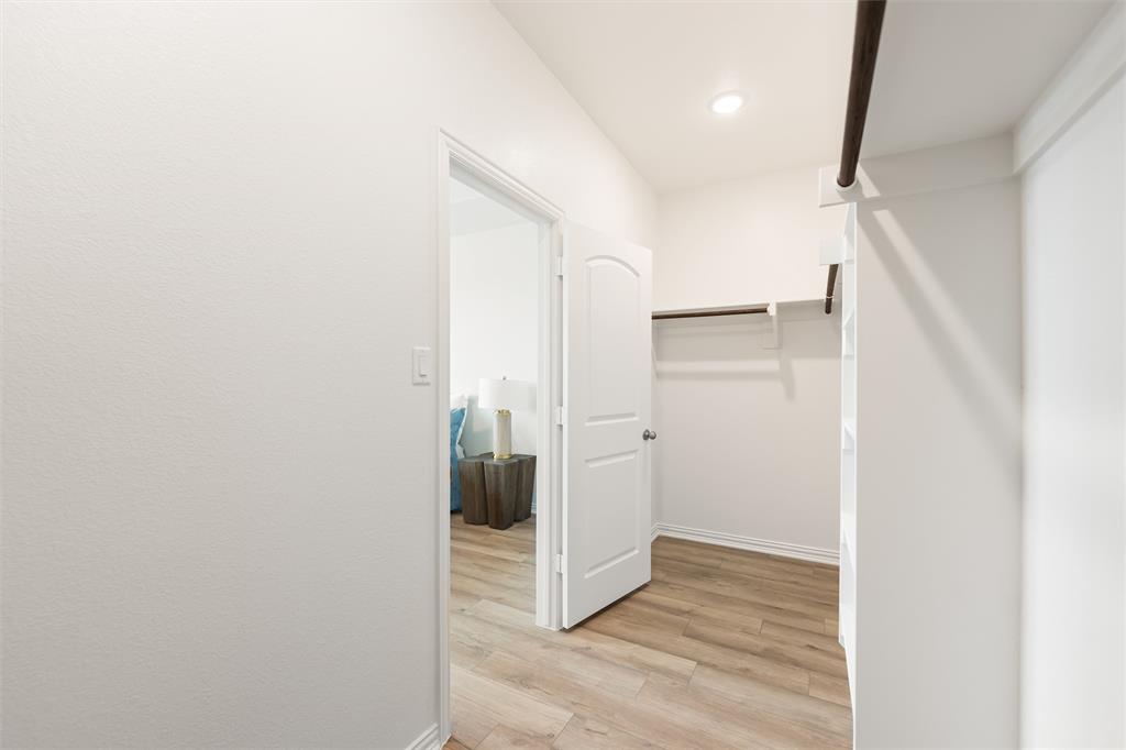 157 Brandywine Trail Rhome, TX 76078 - Photo 22 of 33 Spacious closet featuring light wood-style flooring
