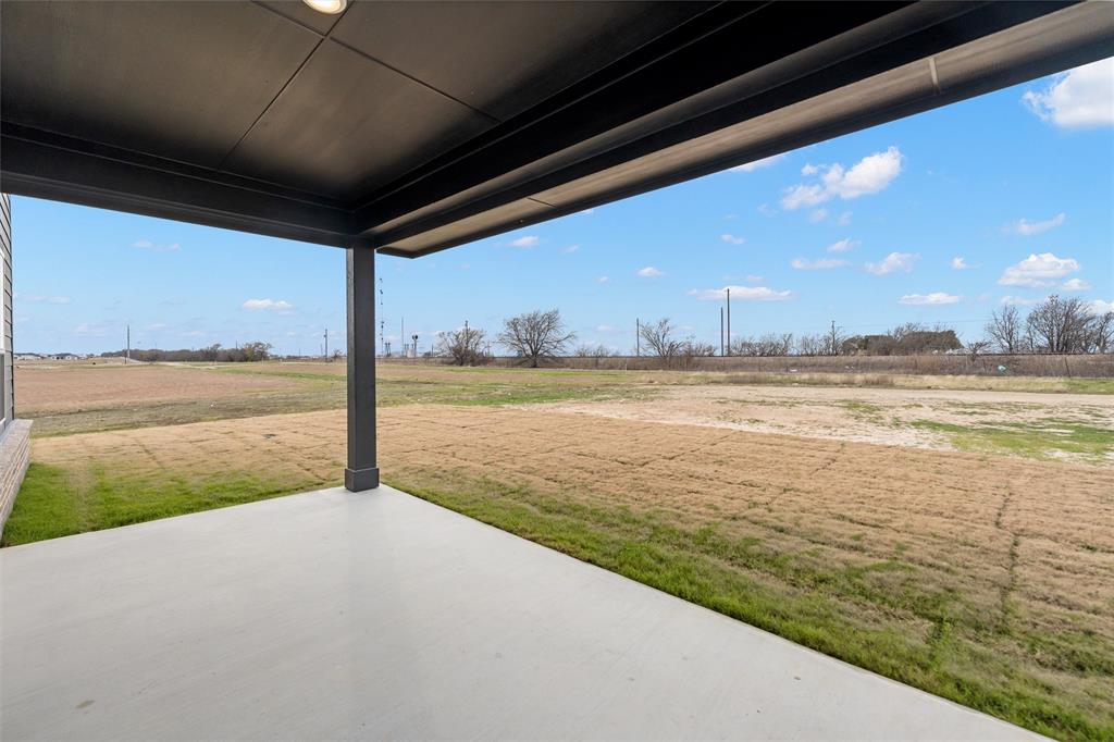 157 Brandywine Trail Rhome, TX 76078 - Photo 29 of 33 View of patio / terrace with a rural view