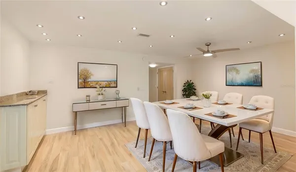 a view of a dining room with furniture