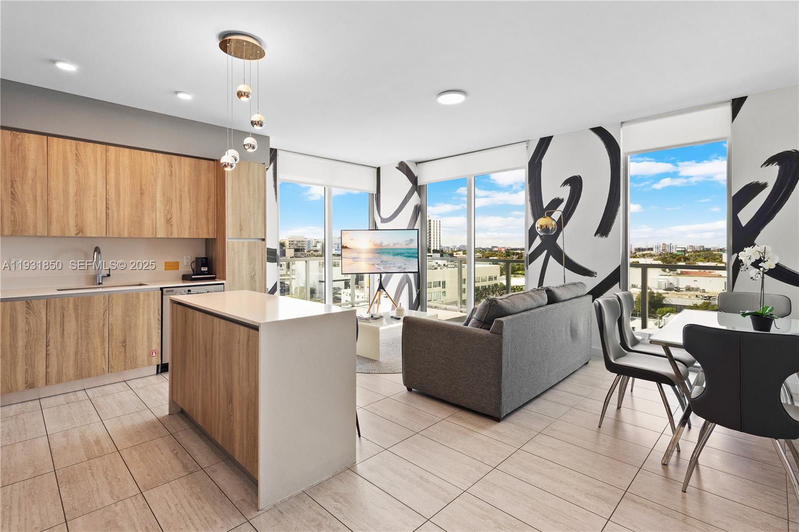 3900 Biscayne Boulevard, Unit S802 Miami, FL 33137 - Photo 3 of 29 a living room with furniture and a large window