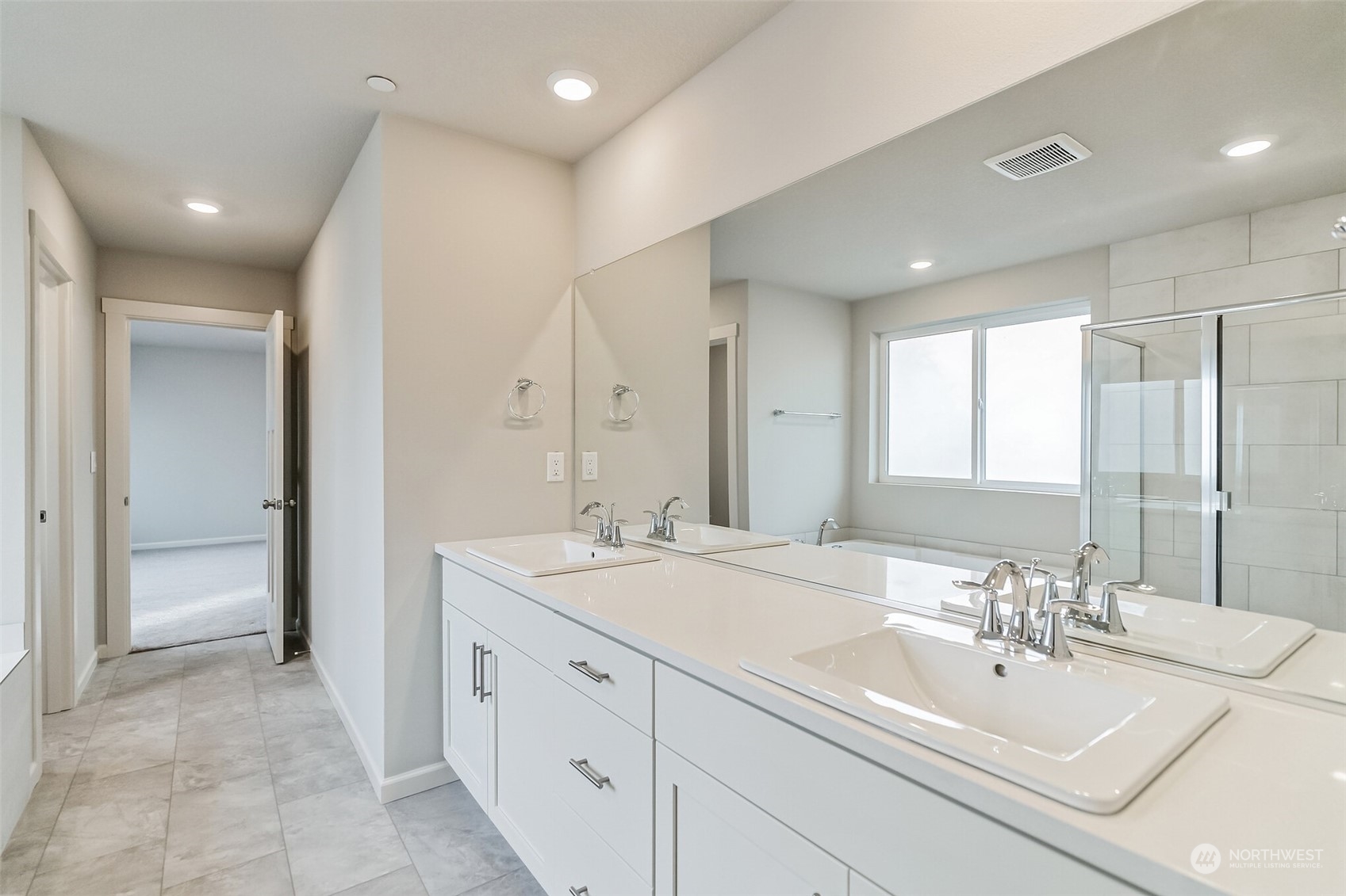 709 South 29th Court Ridgefield, WA 98642 - Photo 19 of 21 a bathroom with a double vanity sink mirror and double