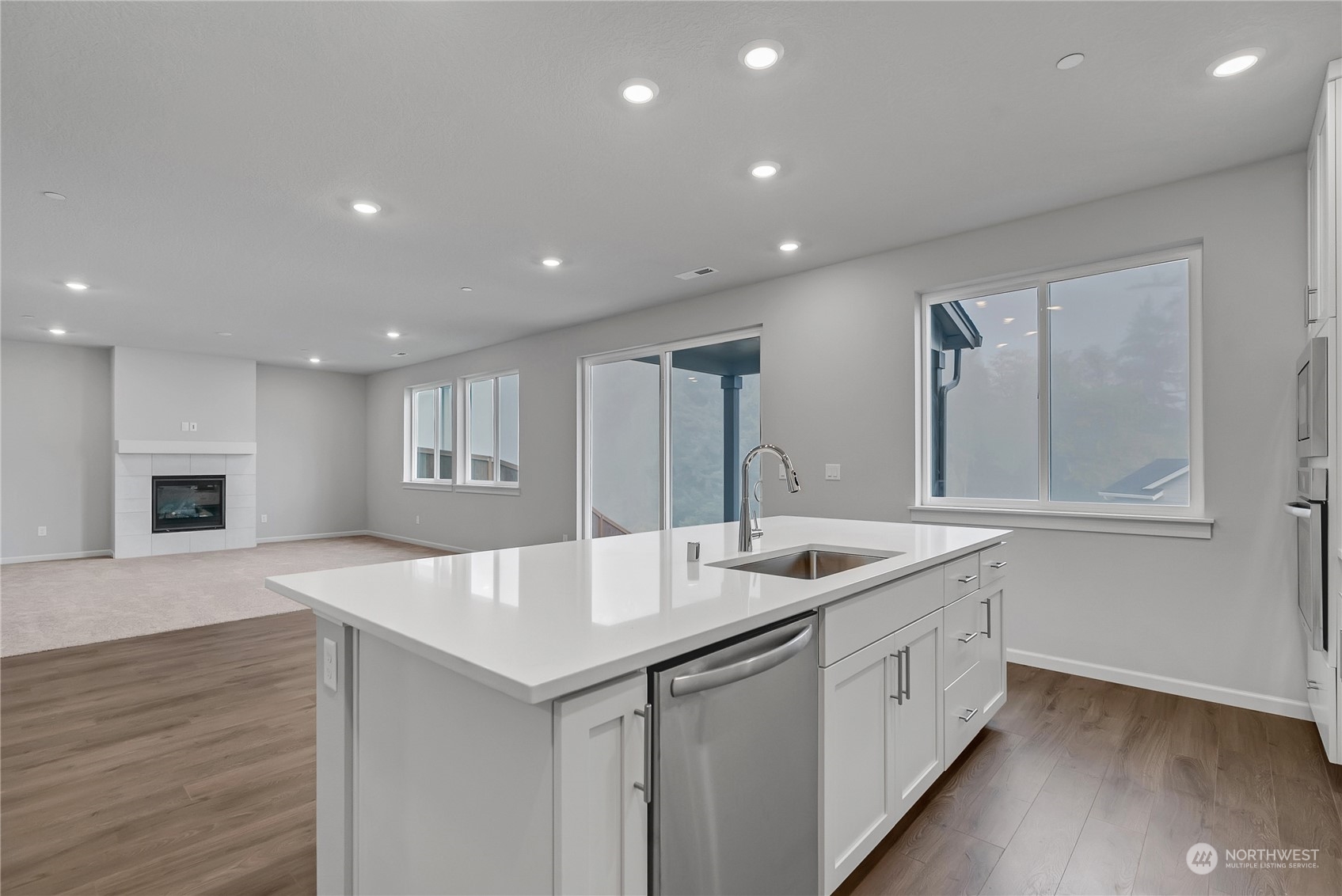 709 South 29th Court Ridgefield, WA 98642 - Photo 8 of 21 a kitchen with sink and mirror