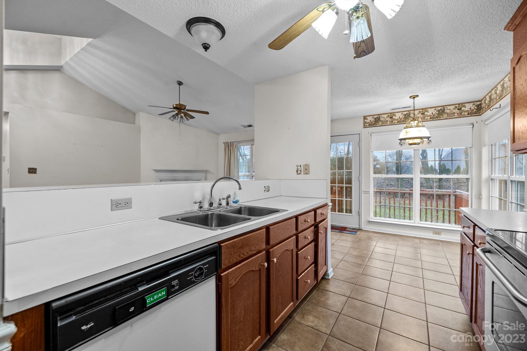 4445 Fawnbrook Avenue Southwest Concord, NC 28027 - Photo 11 of 27 a kitchen with a sink appliances and cabinets