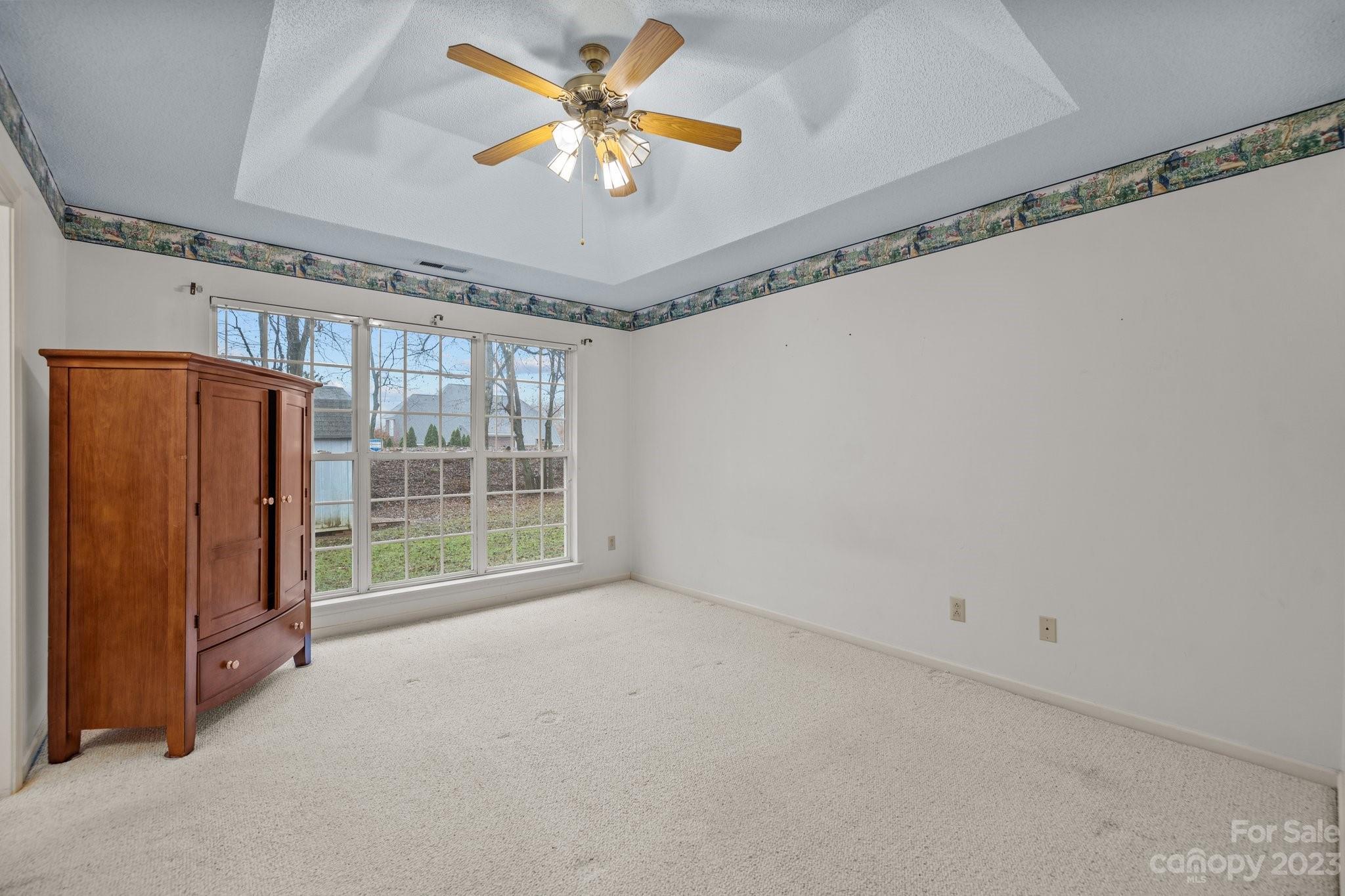 4445 Fawnbrook Avenue Southwest Concord, NC 28027 - Photo 12 of 27 a view of an empty room with a window
