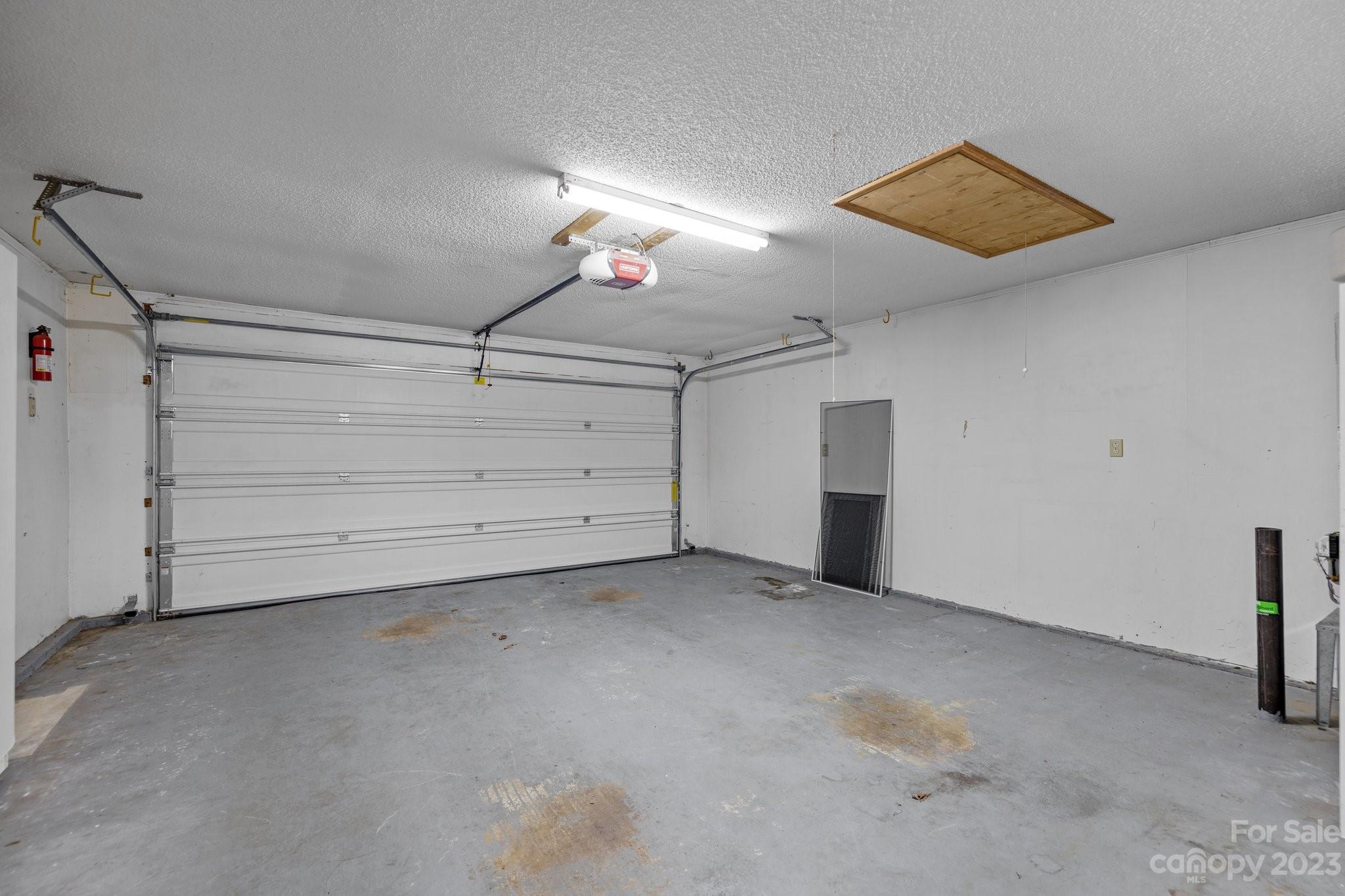 4445 Fawnbrook Avenue Southwest Concord, NC 28027 - Photo 22 of 27 a view of a room with storage and utility room