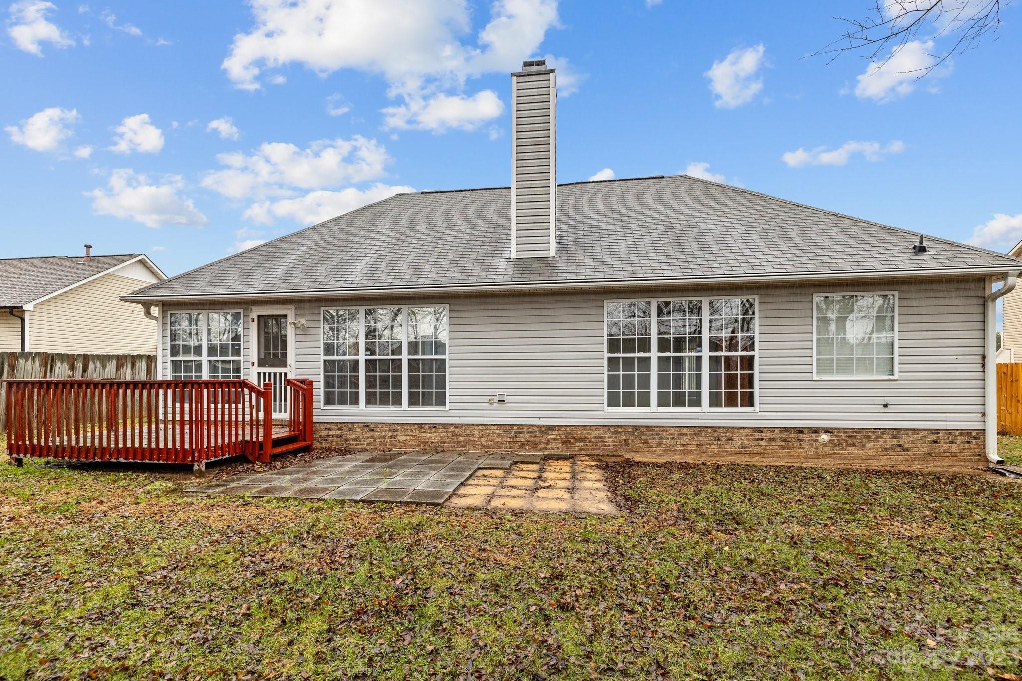 4445 Fawnbrook Avenue Southwest Concord, NC 28027 - Photo 24 of 27 a front view of a house with a garden