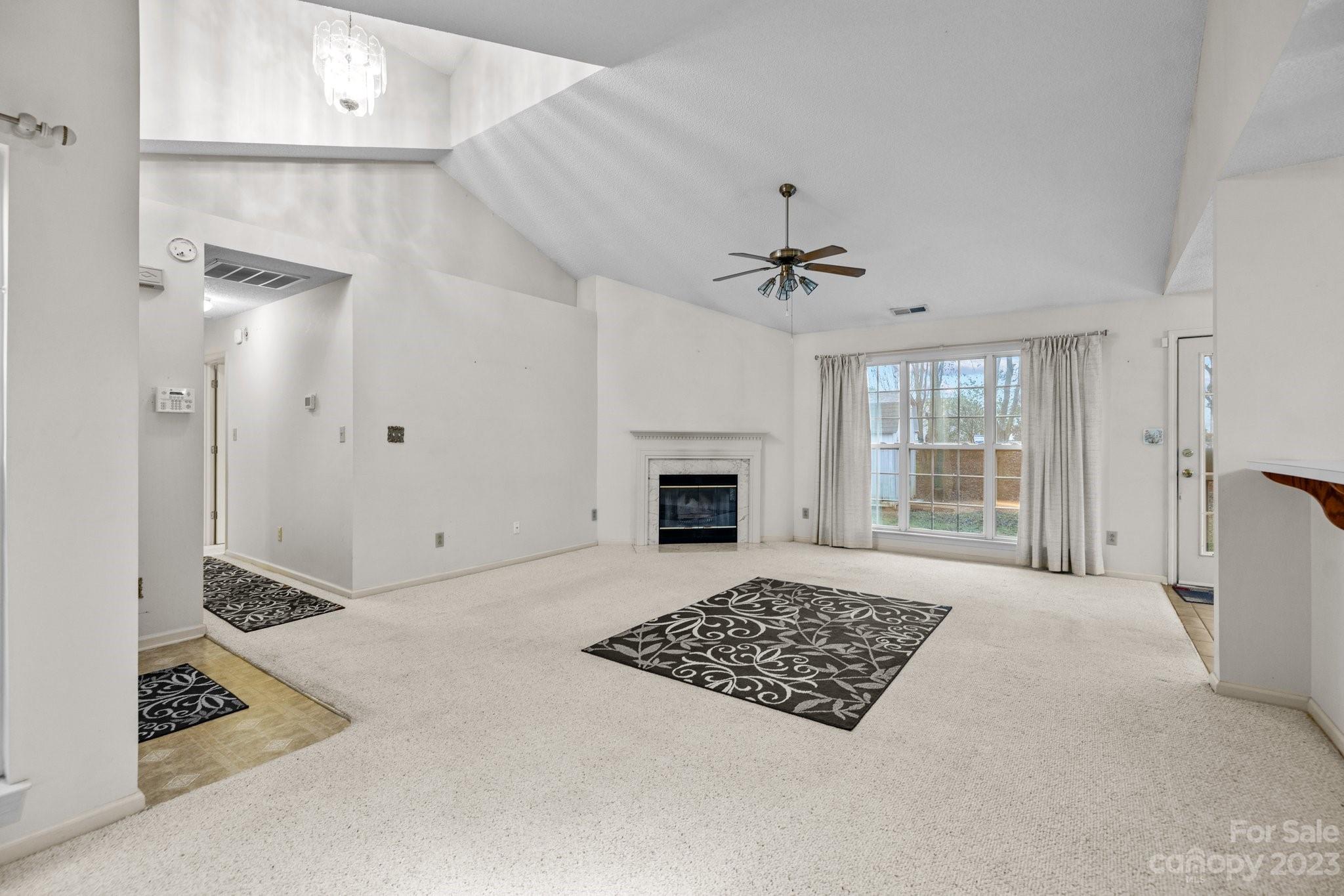 4445 Fawnbrook Avenue Southwest Concord, NC 28027 - Photo 4 of 27 a view of a livingroom with a fireplace and window