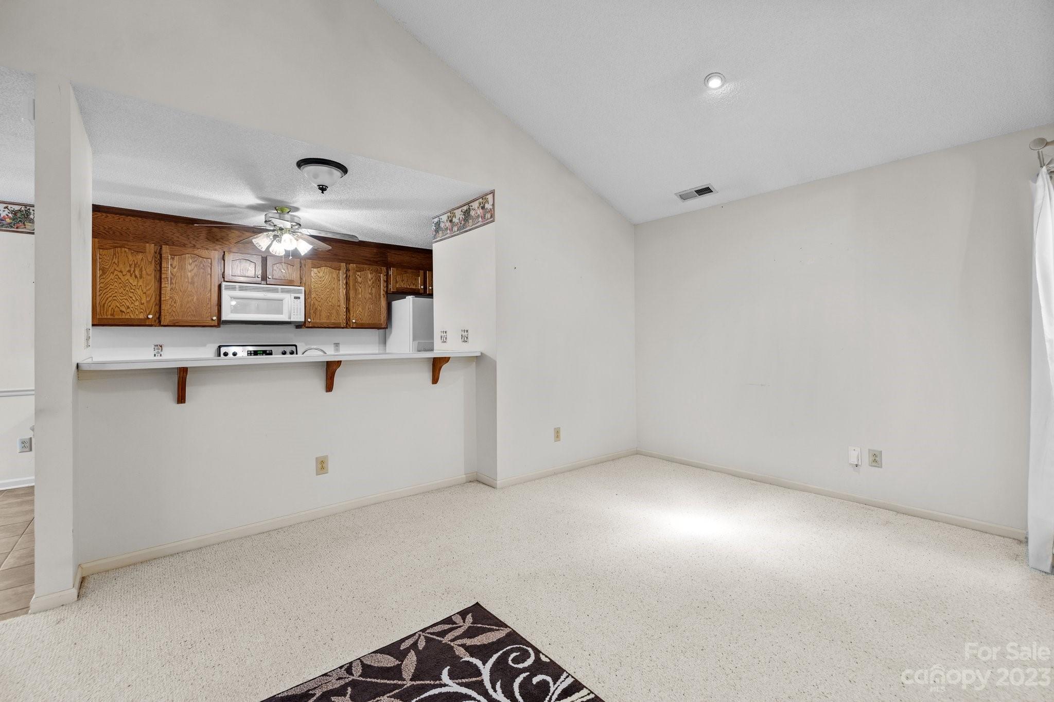 4445 Fawnbrook Avenue Southwest Concord, NC 28027 - Photo 6 of 27 a view of kitchen with stainless steel appliances cabinets and a window
