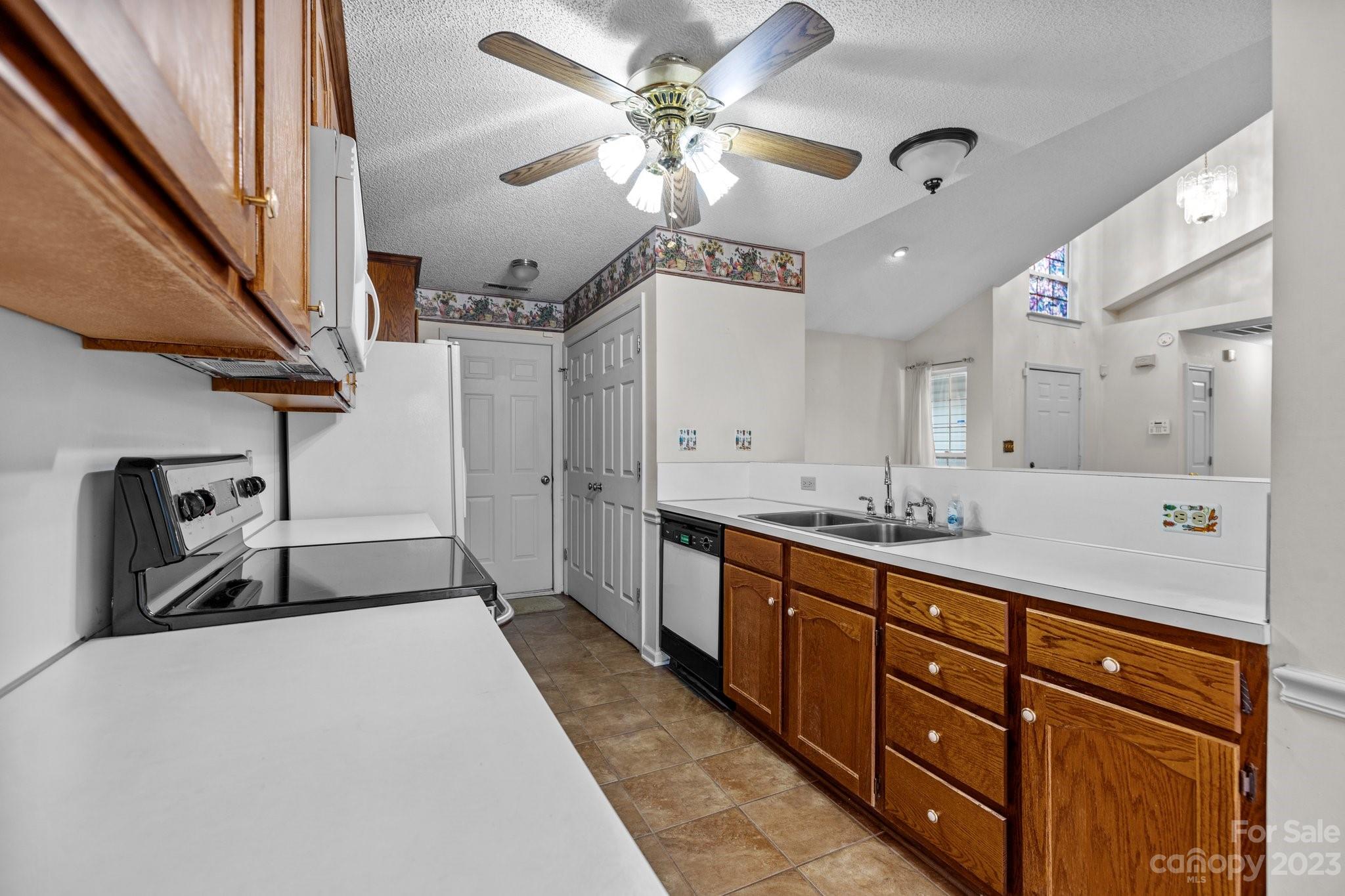 4445 Fawnbrook Avenue Southwest Concord, NC 28027 - Photo 9 of 27 a spacious bathroom with a double vanity sink a mirror and a shower