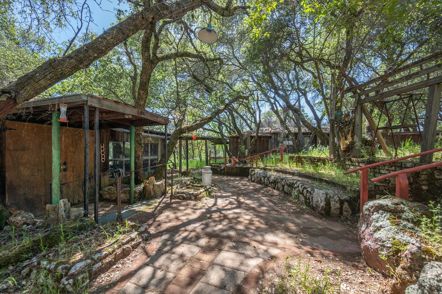 2000 Highway 193 Cool, CA 95614 - Photo 25 of 33 a view of a chair and table under an umbrella