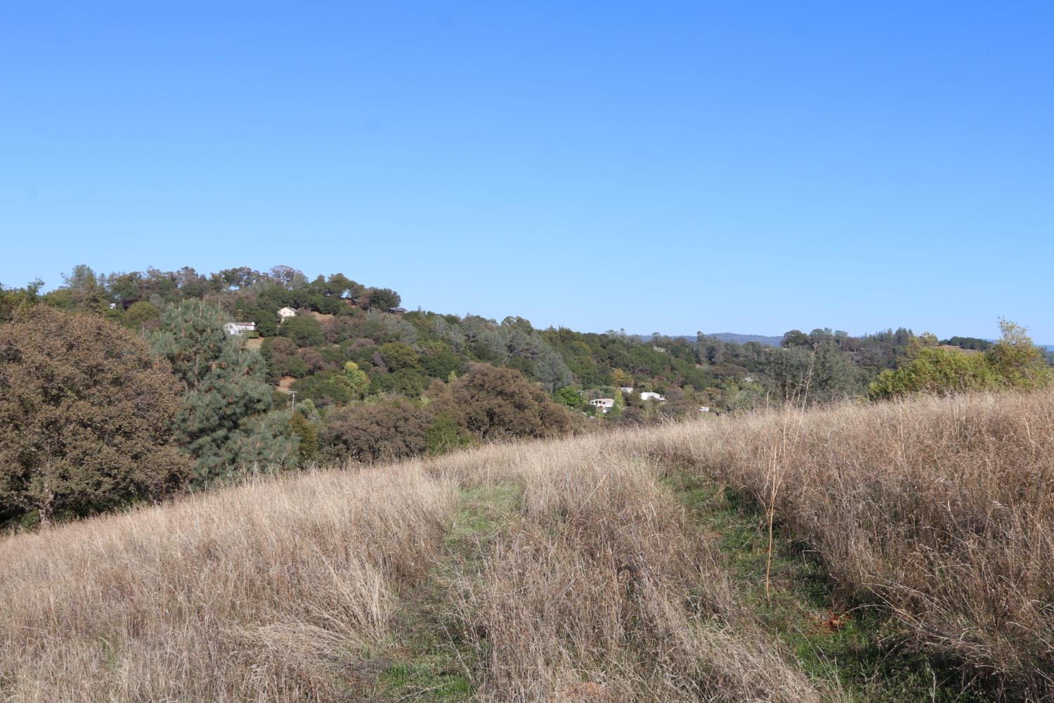 2000 Highway 193 Cool, CA 95614 - Photo 5 of 33 a view of a lake with a mountain in the background