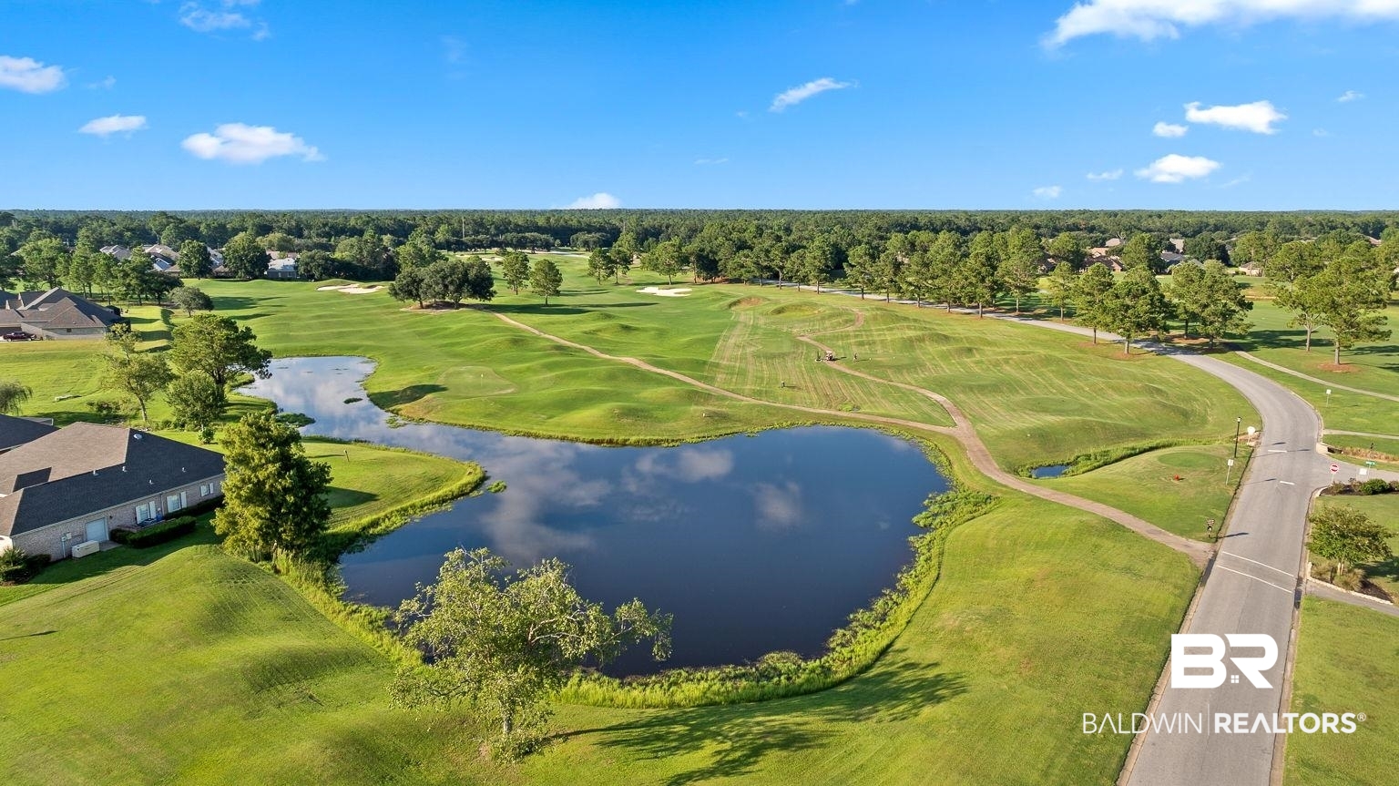 23357 Carnoustie Drive Foley, AL 36535 - Photo 98 of 99 Aerial view of a nearby body of water and a golf club