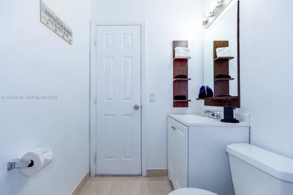 a bathroom with a toilet and a sink