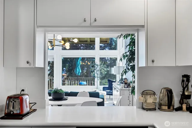 a kitchen with a faucet a sink and cabinets